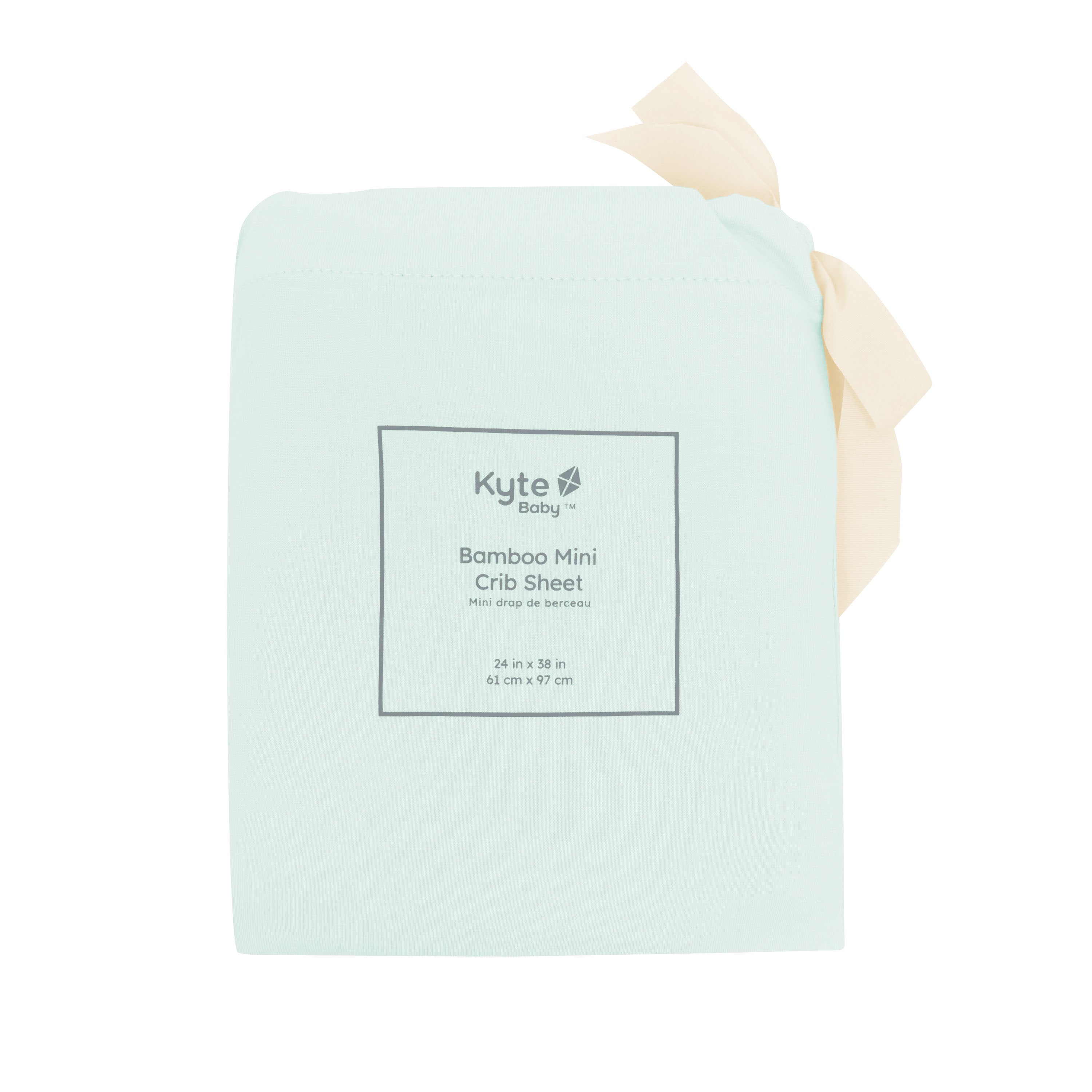 Mini Crib Sheet in Dew shown in its packaging