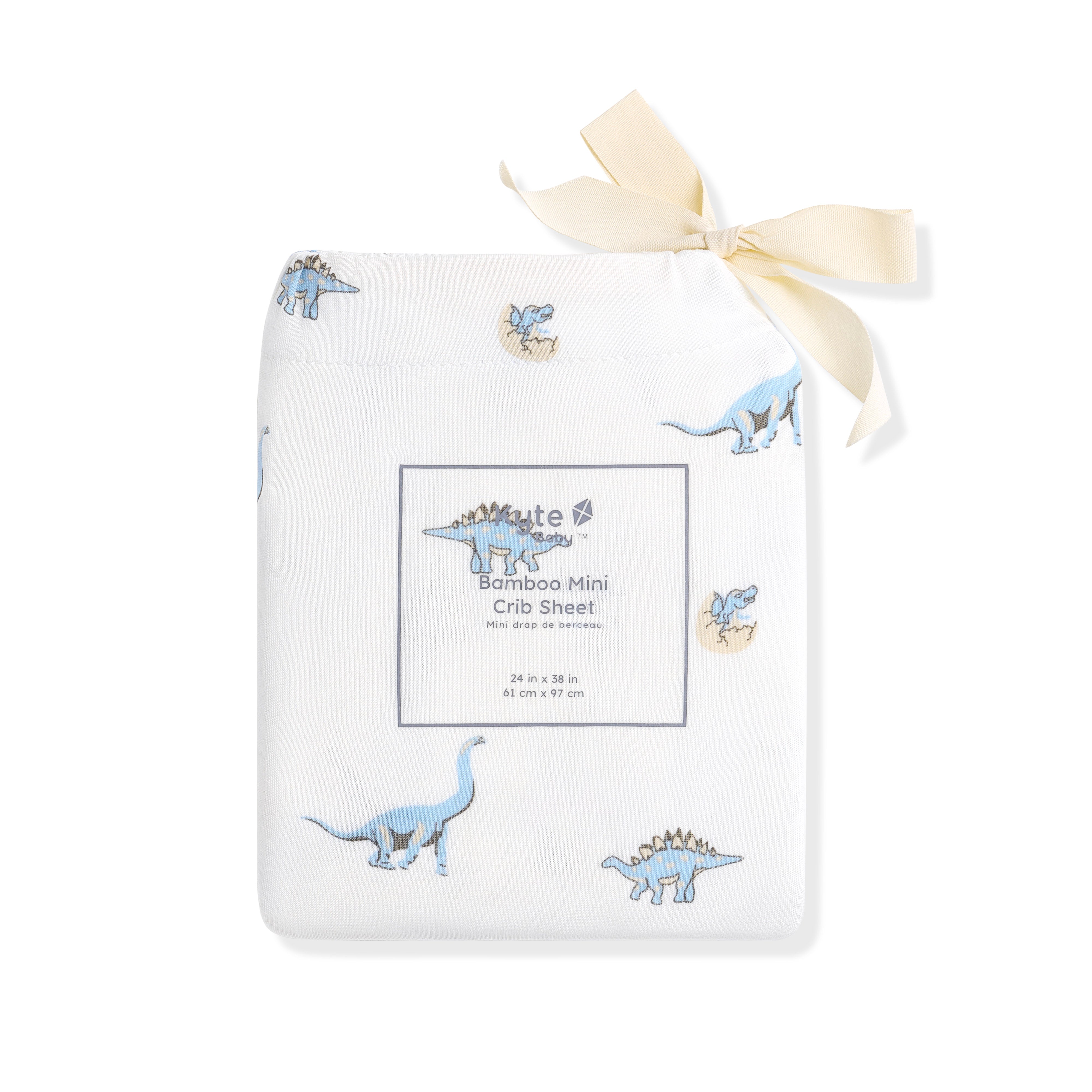 Mini Crib Sheet in Jurassic shown in its packaging