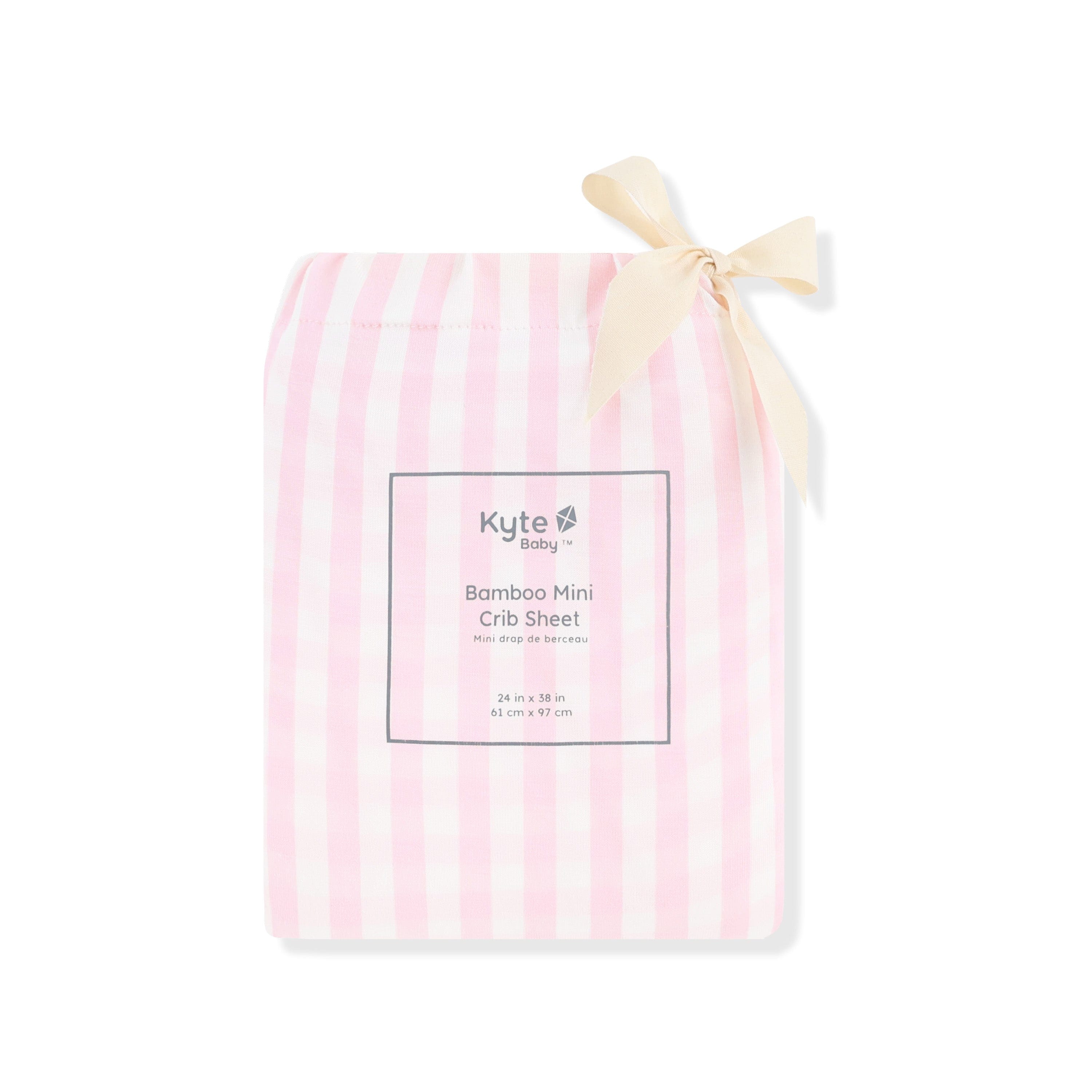 Mini Crib Sheet in Small Sakura Stripe shown in its packaging