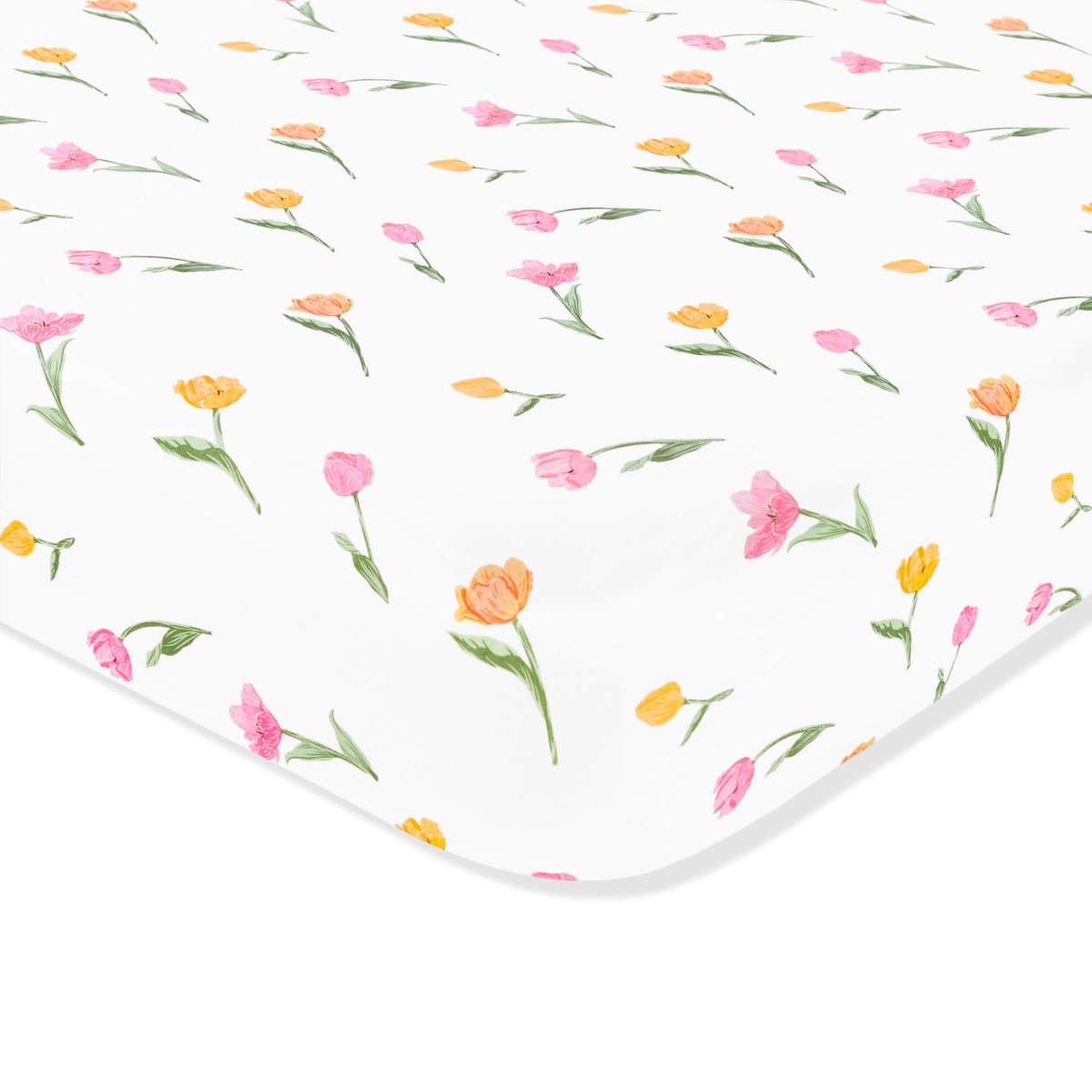 Corner of the Mini Crib Sheet in Tulip shown on a mattress
