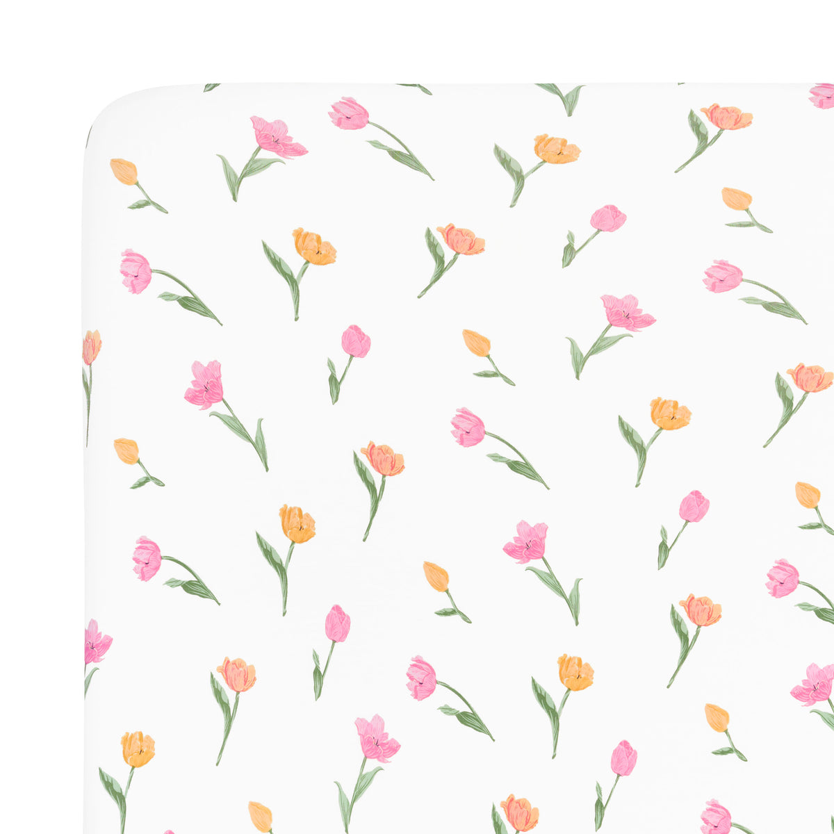 Close up of the Mini Crib Sheet in Tulip shown on a mattress