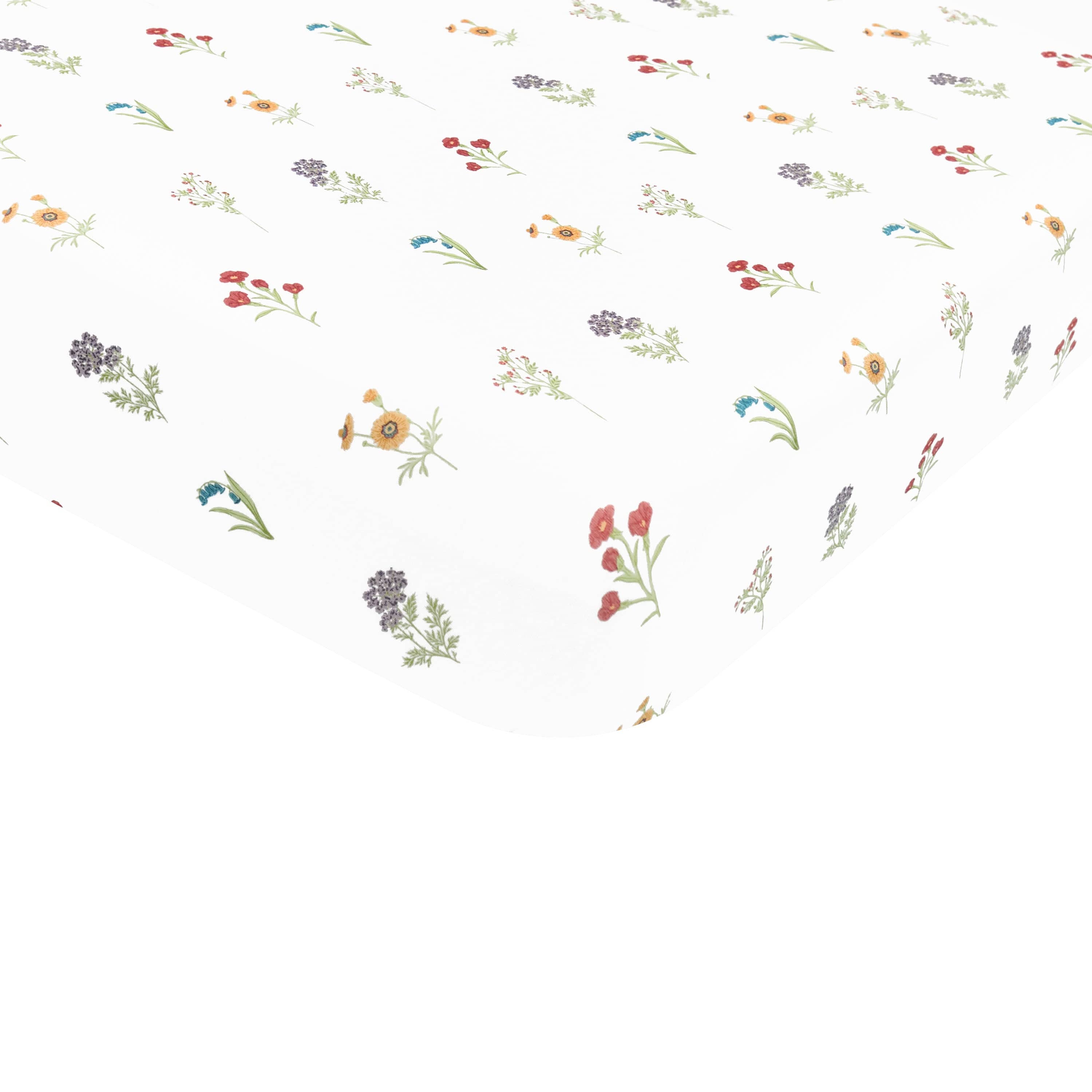 Corner of mattress with Mini Crib Sheet/Crib Sheet in Wildflower
