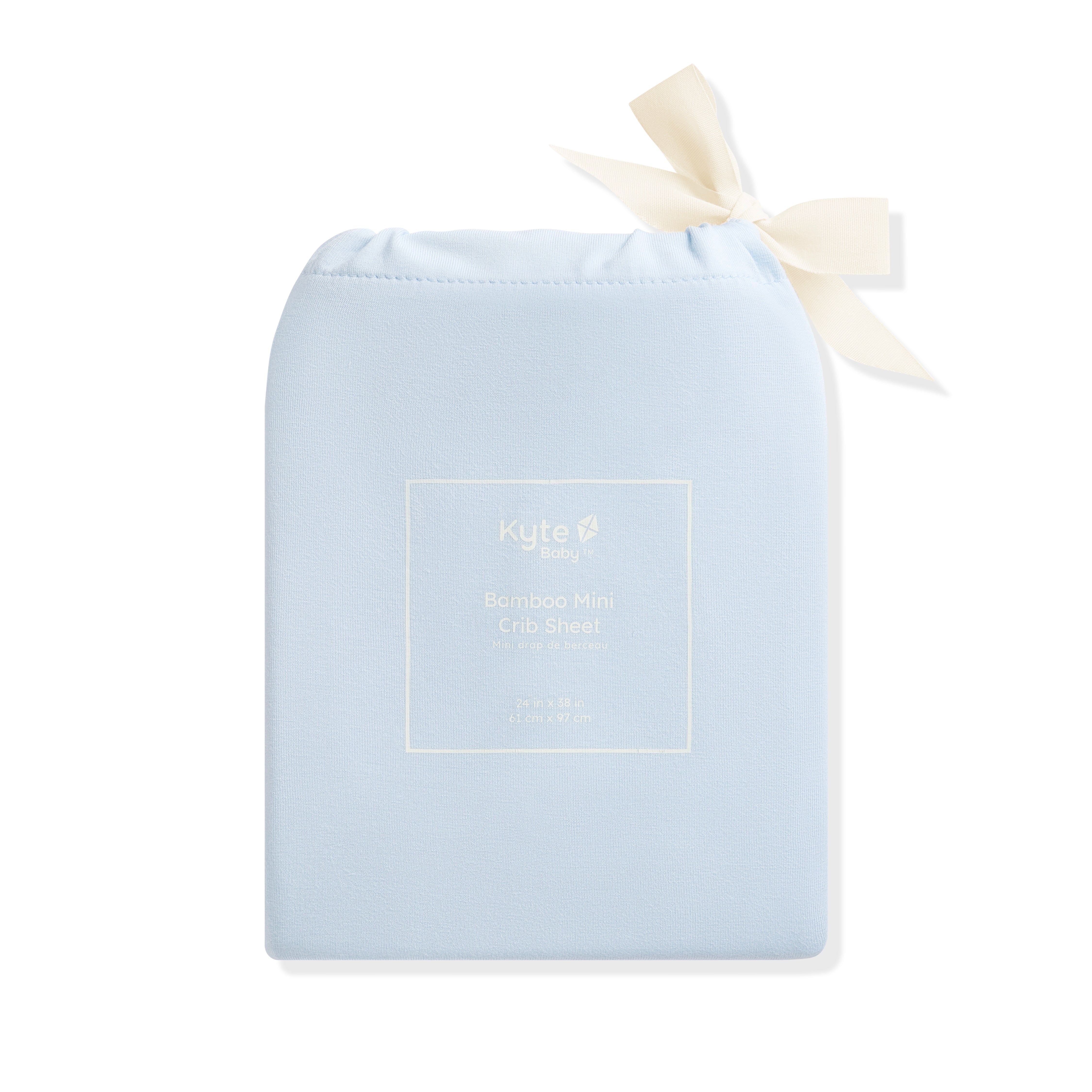 Mini Crib Sheet in Breeze shown in its packaging