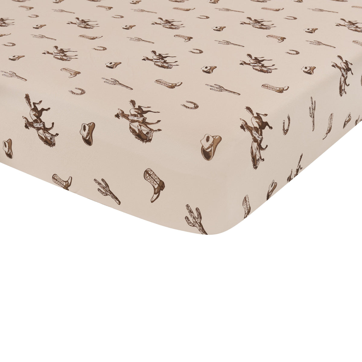 Corner of the Crib Sheet in Classic Cowboy shown on a crib mattress