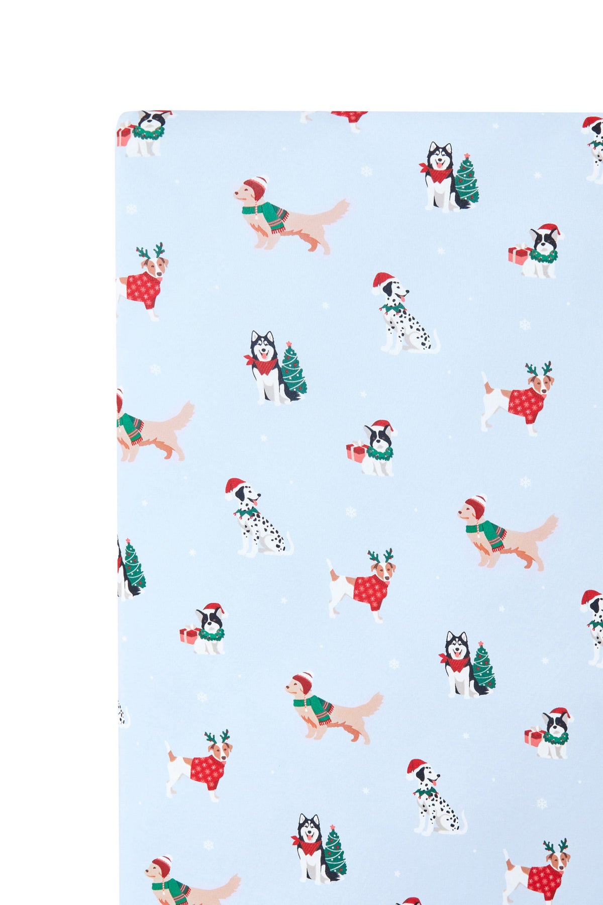 Close up of Blue Crib Sheet in Holiday Pups print on a white background