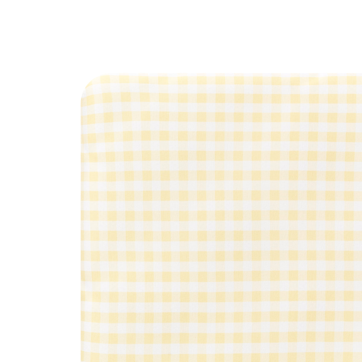 Close up of the Crib Sheet in Gingham Chamomile on a mattress