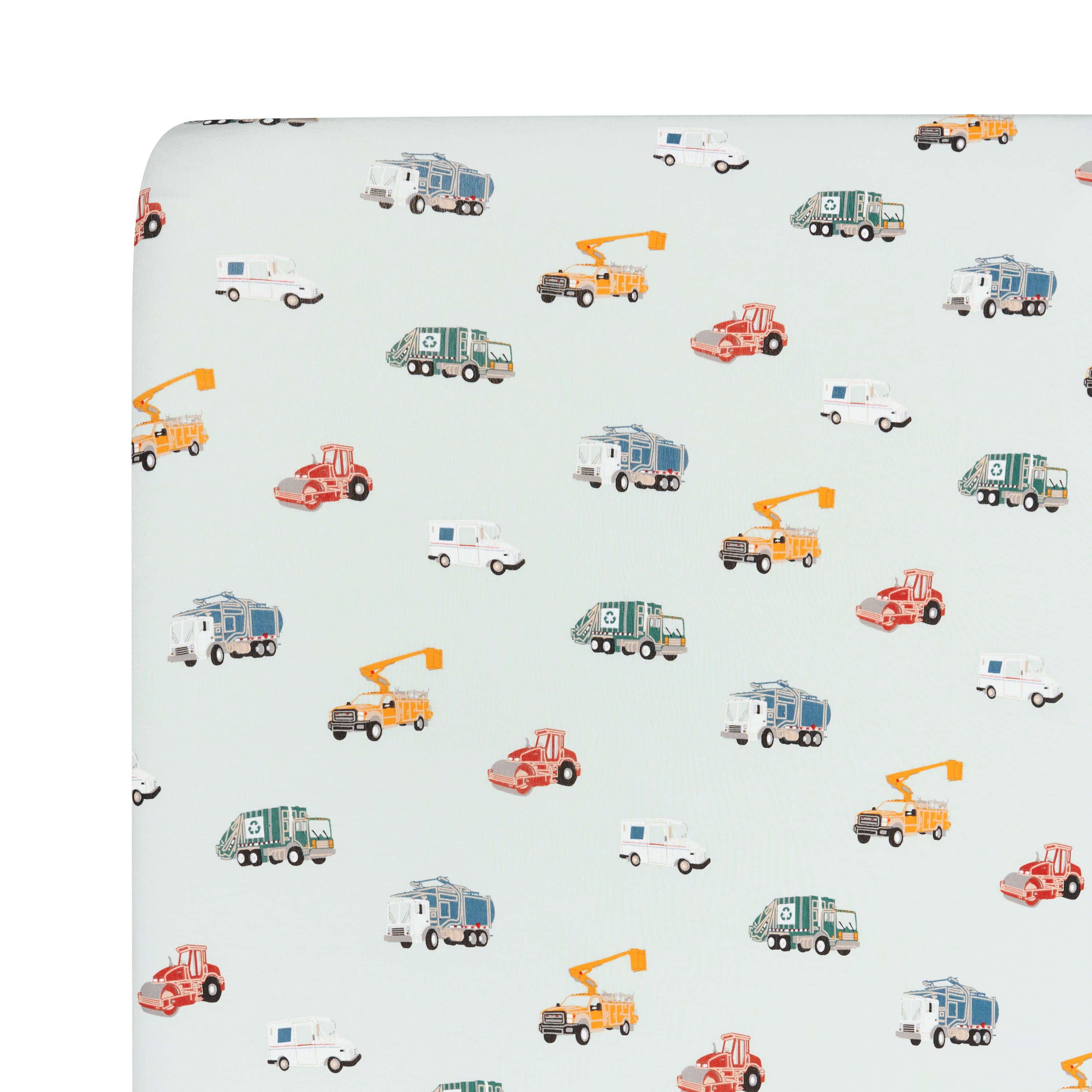 Close up of the Crib Sheet in City Vehicles shown on a crib mattress