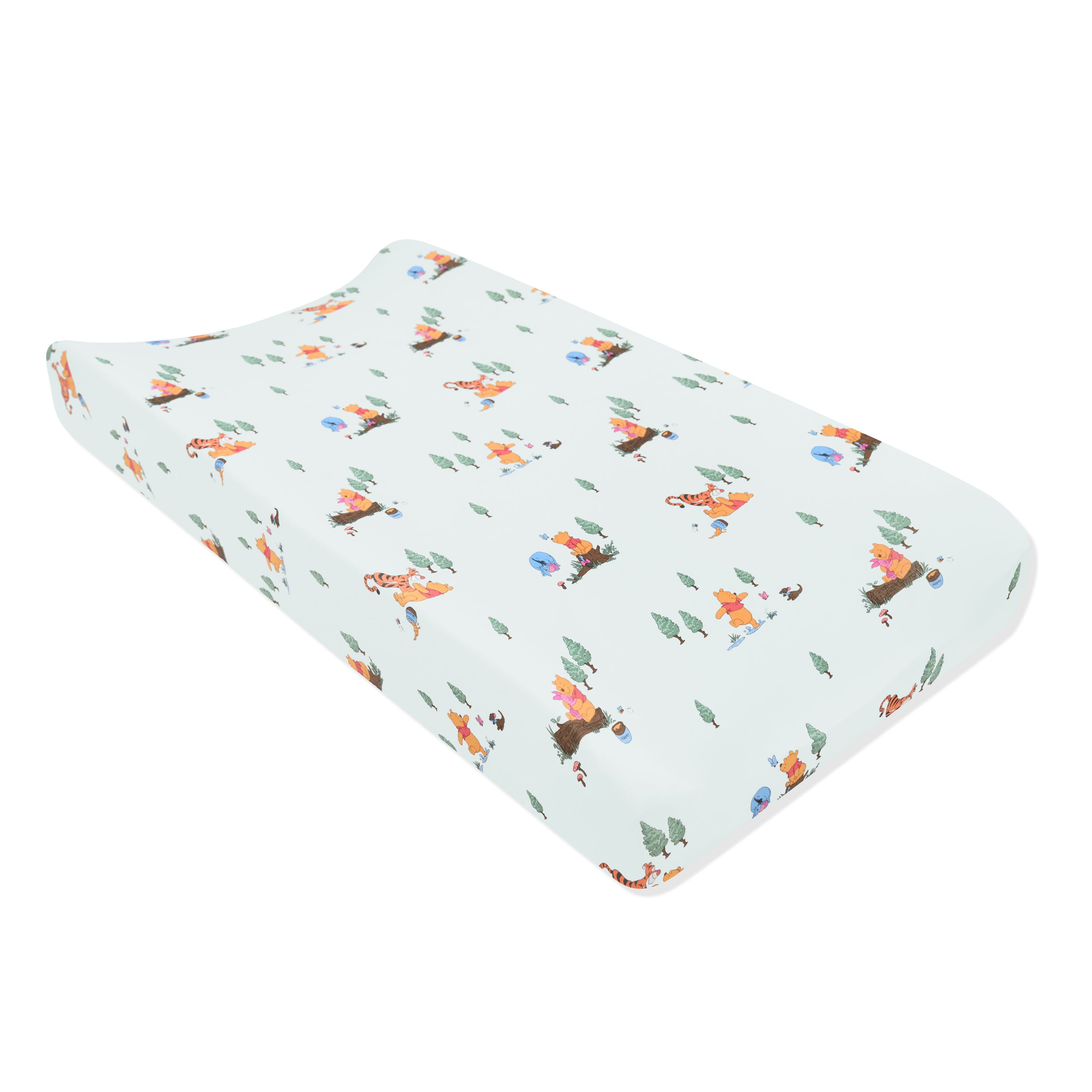 The Change Pad Cover in Winnie the Pooh Hundred Acre Wood shown on a change pad