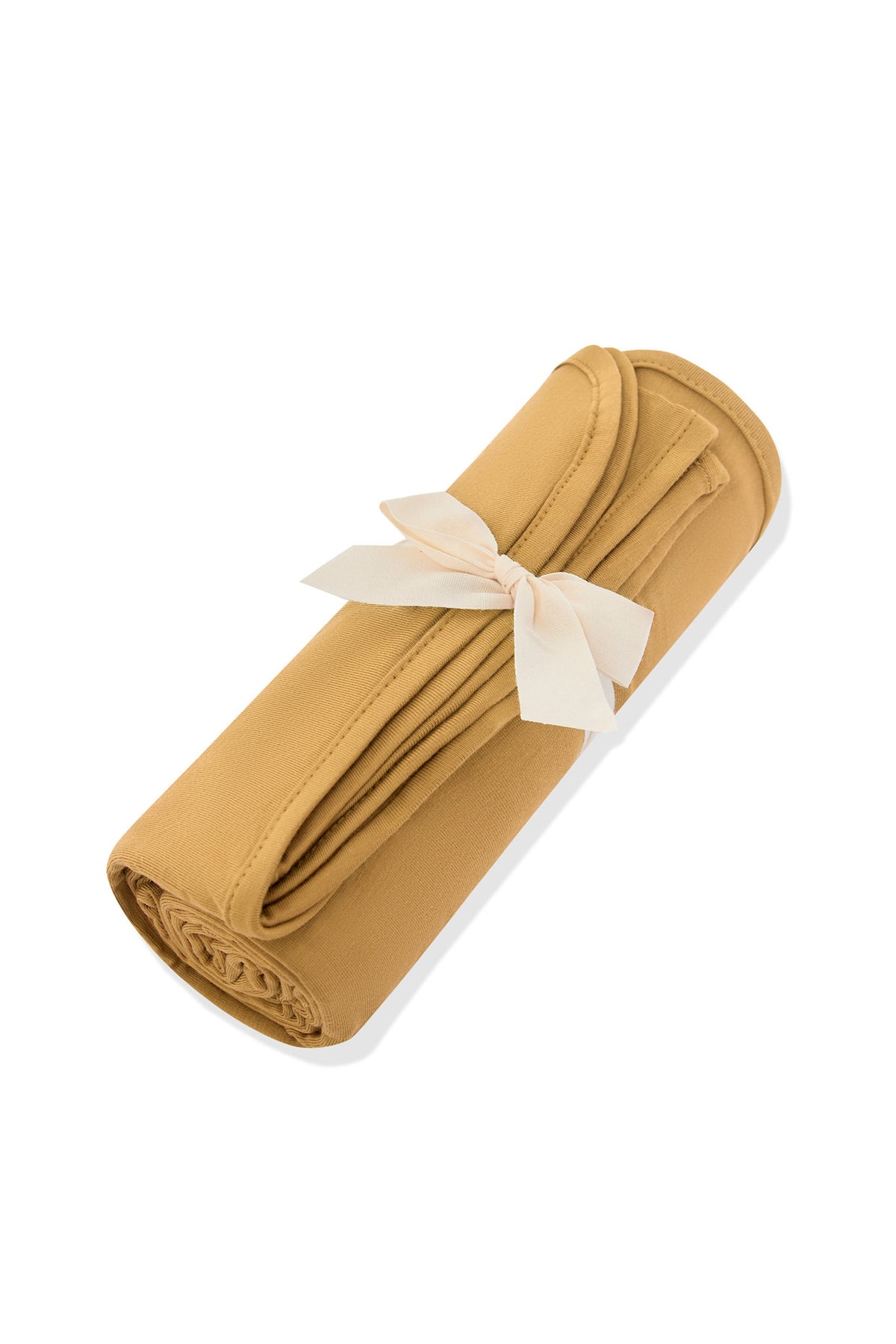 Swaddle Blanket in Ochre rolled and tied with a ribbon on a white background