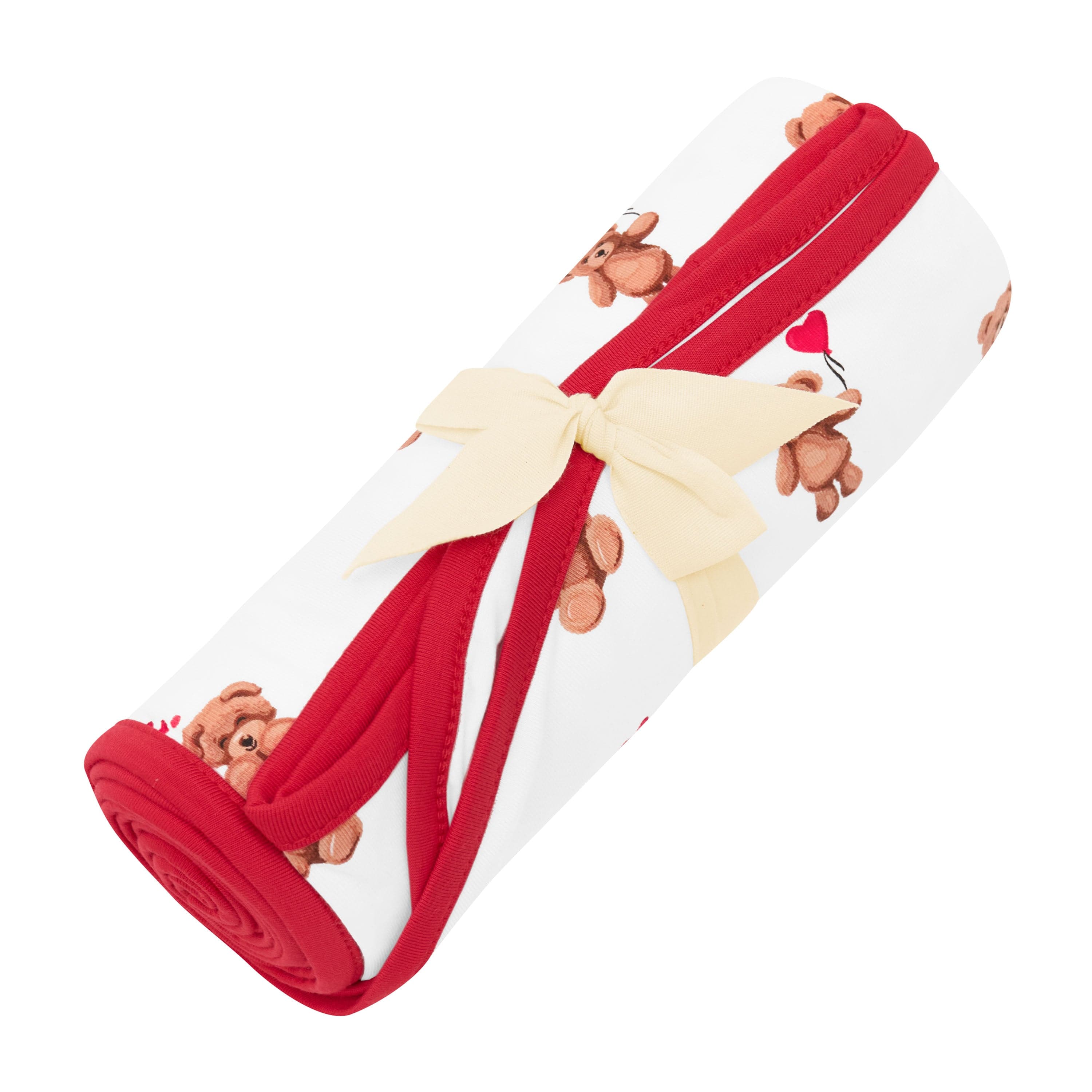 Swaddle Blanket in Bear Hearts shown in its packaging tied with a linen bow