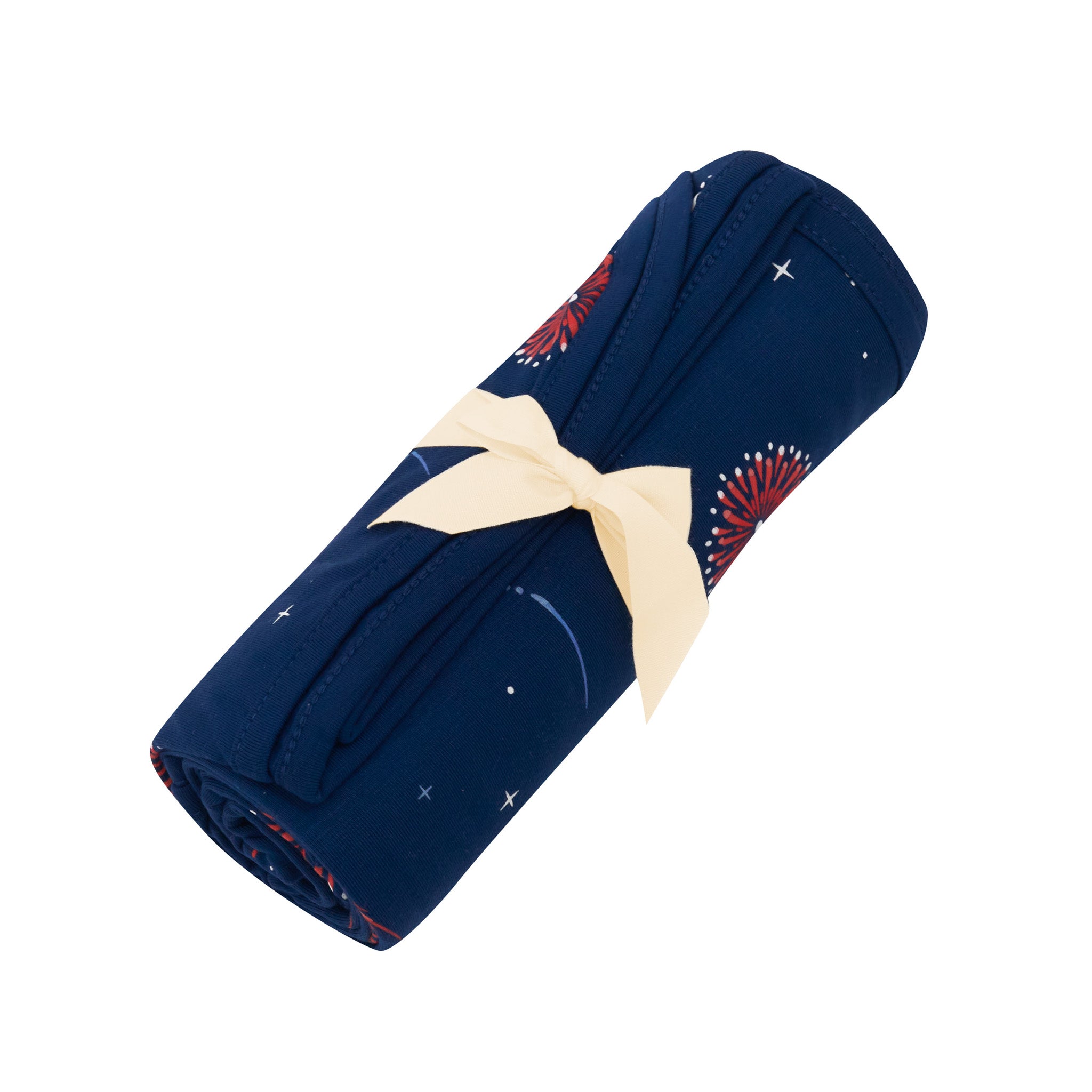 Swaddle Blanket in Celebration rolled in its packaging