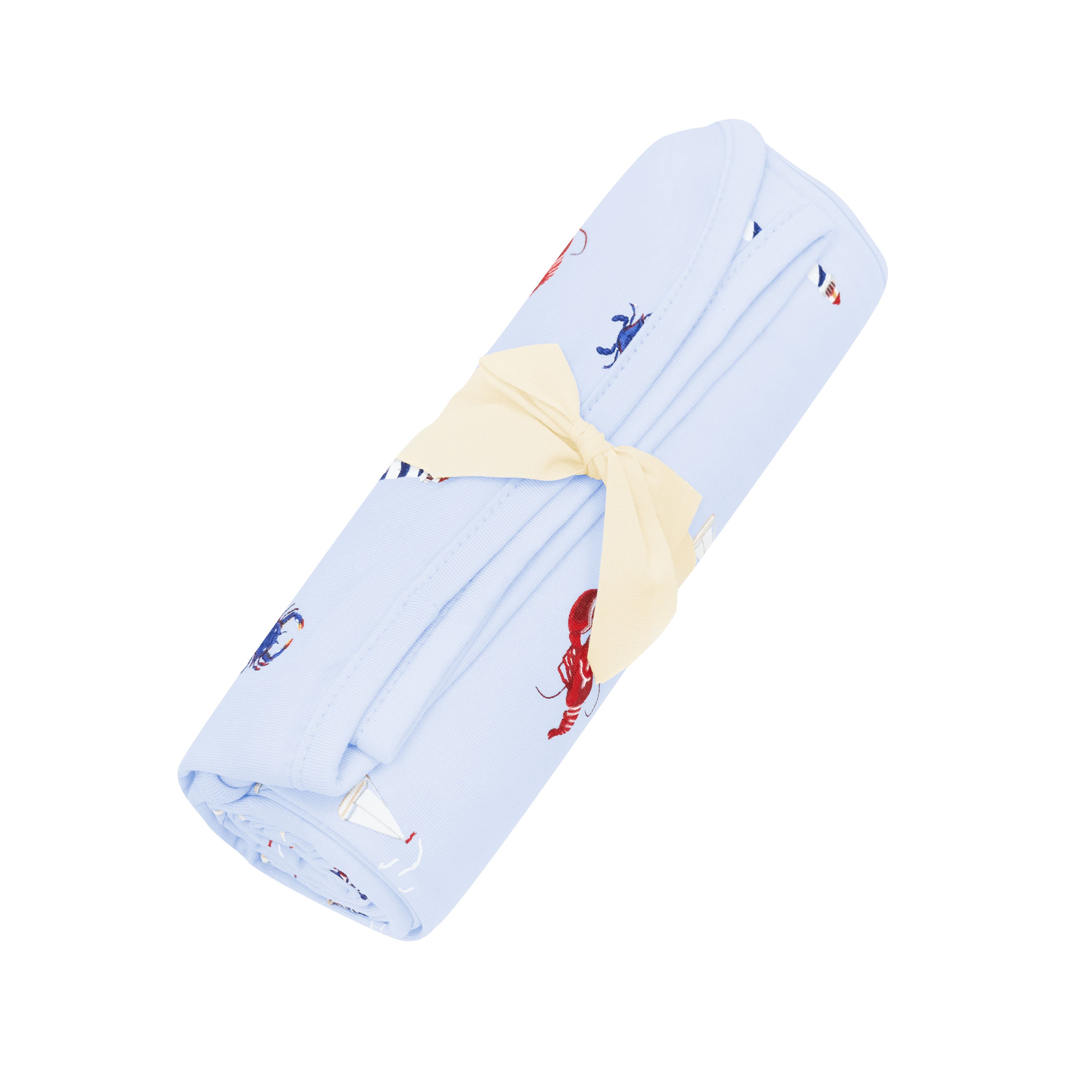 Swaddle Blanket in Harbor shown rolled in its packaging