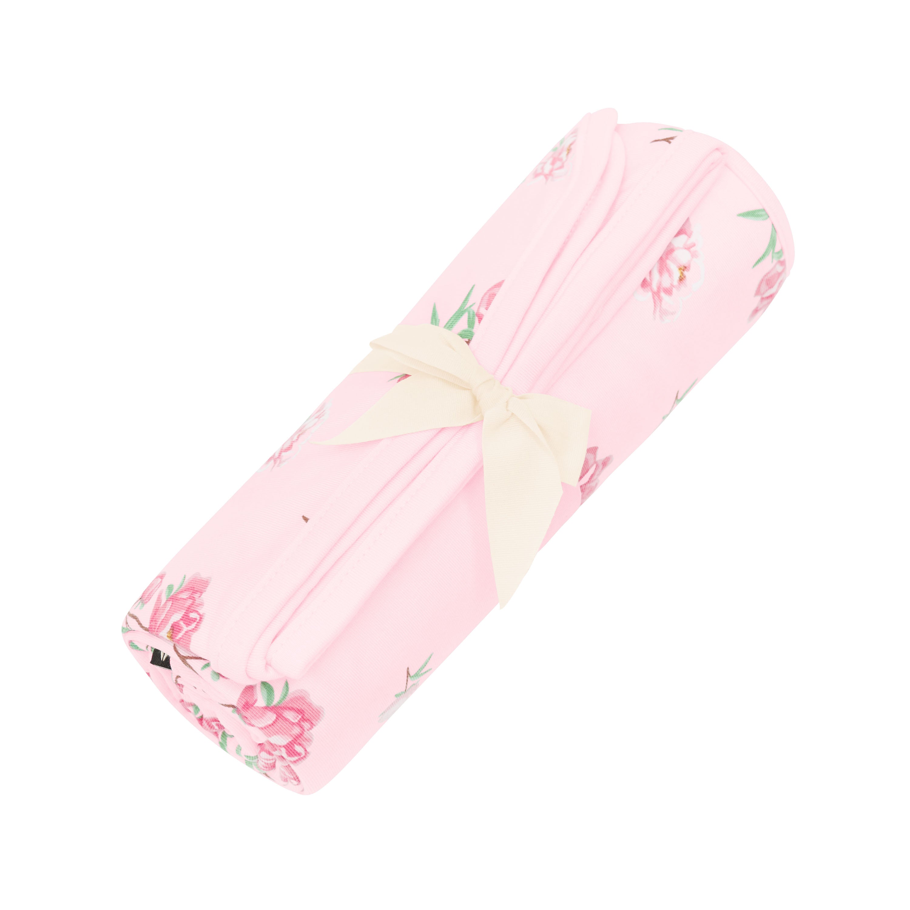 Swaddle Blanket in Sakura Peony shown in its packaging