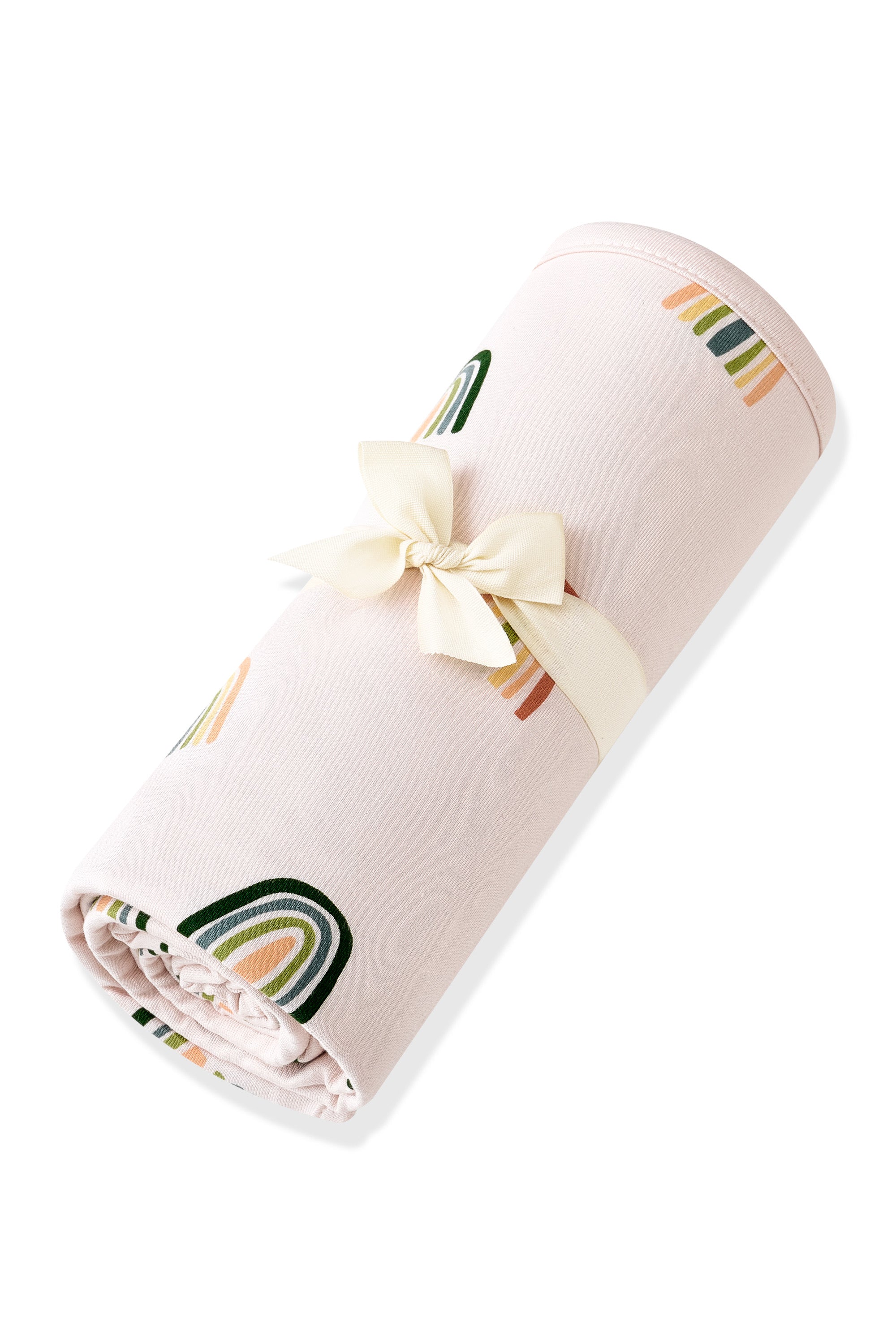 Vanilla cream Swaddle Blanket in Retro Rainbow print rolled up with a ribbon a on a white background