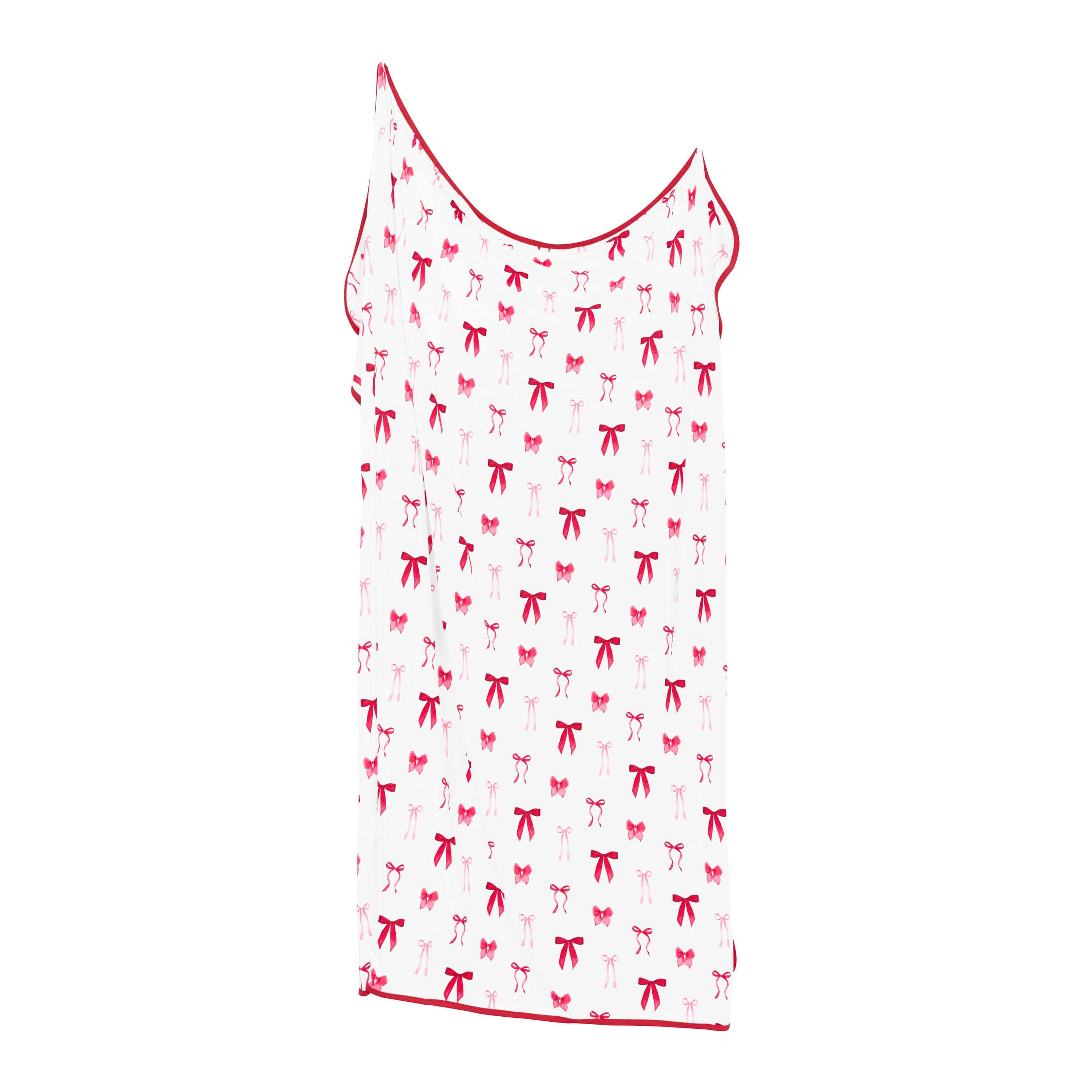 The light and stretchy Swaddle Blanket in Small Love Bow shown unswaddled