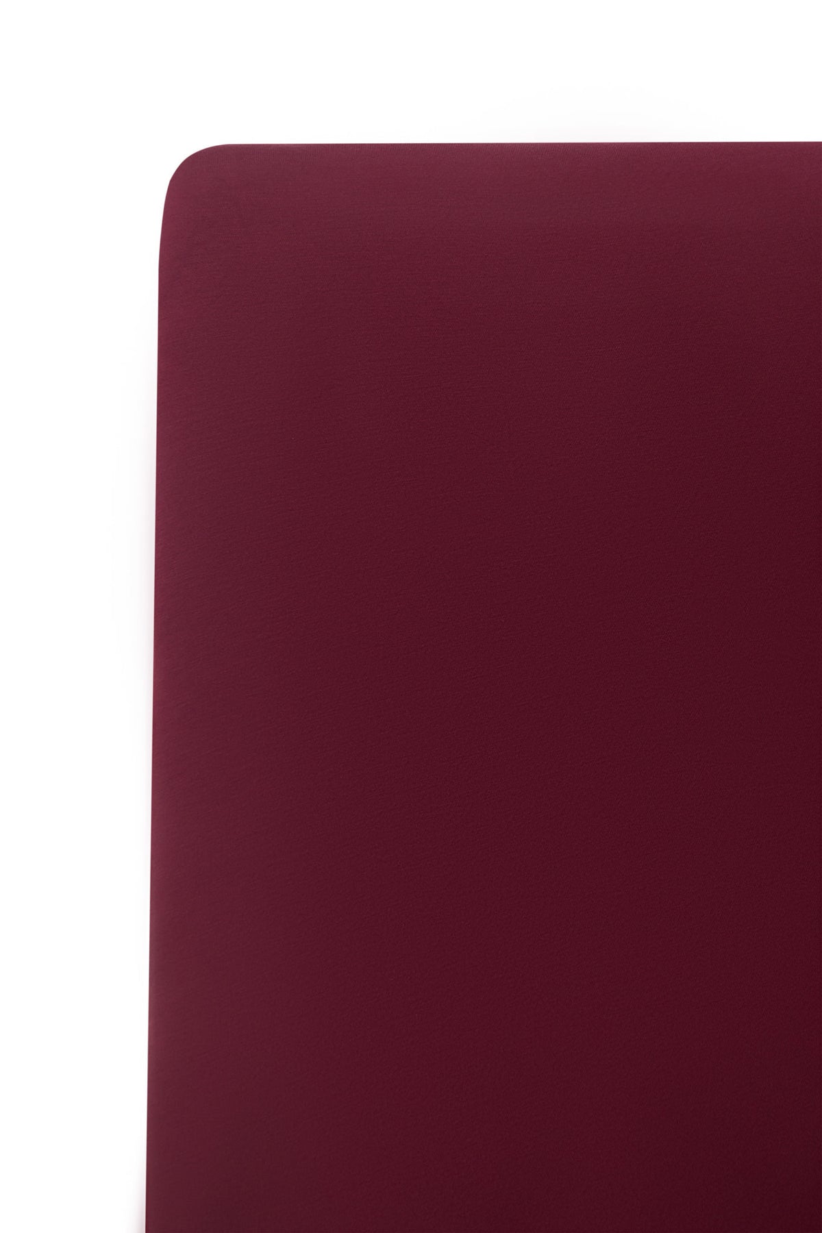 Close up of Twin Sheet in Burgundy on a white background