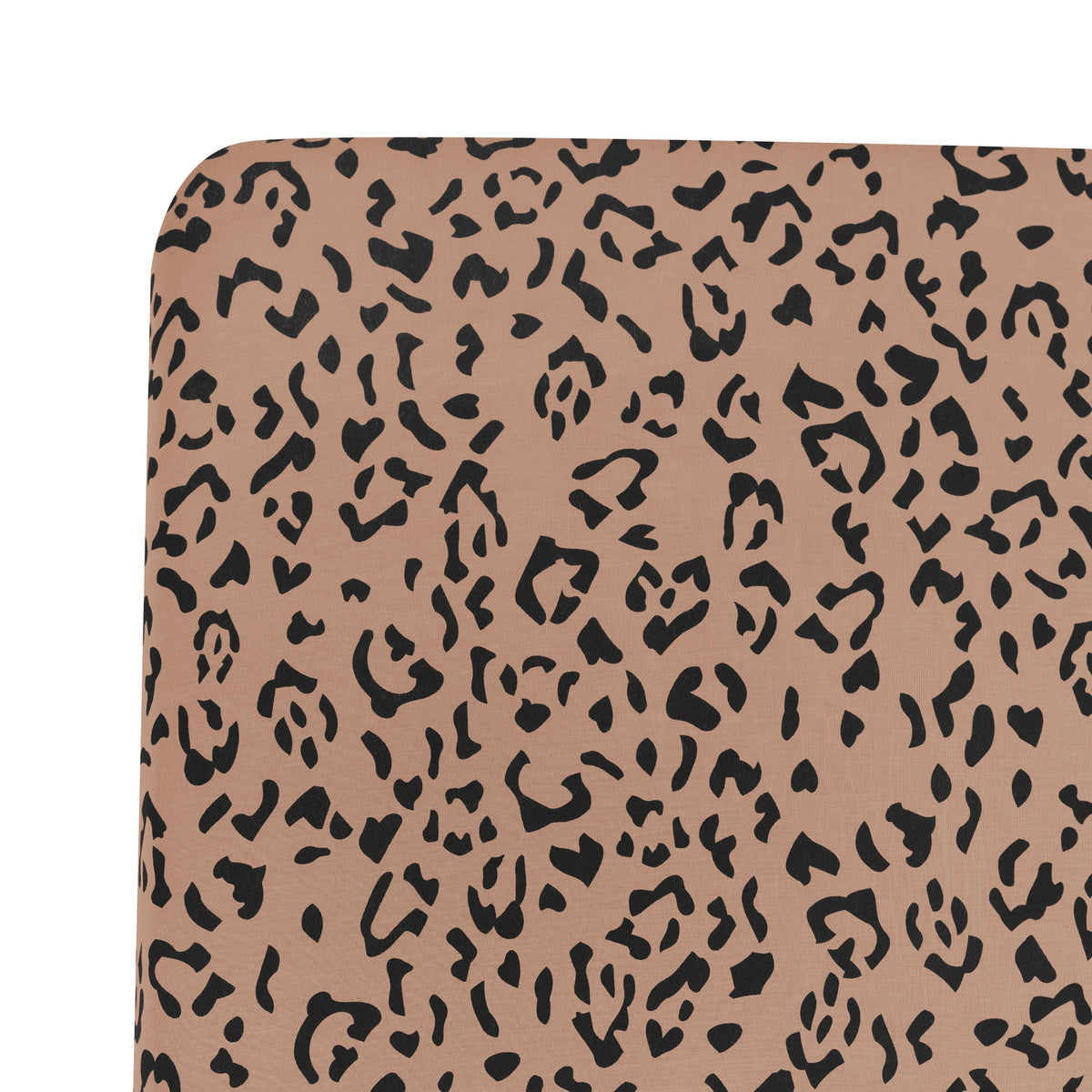 Close up of the Twin Sheet in Latte Leopard on a mattress