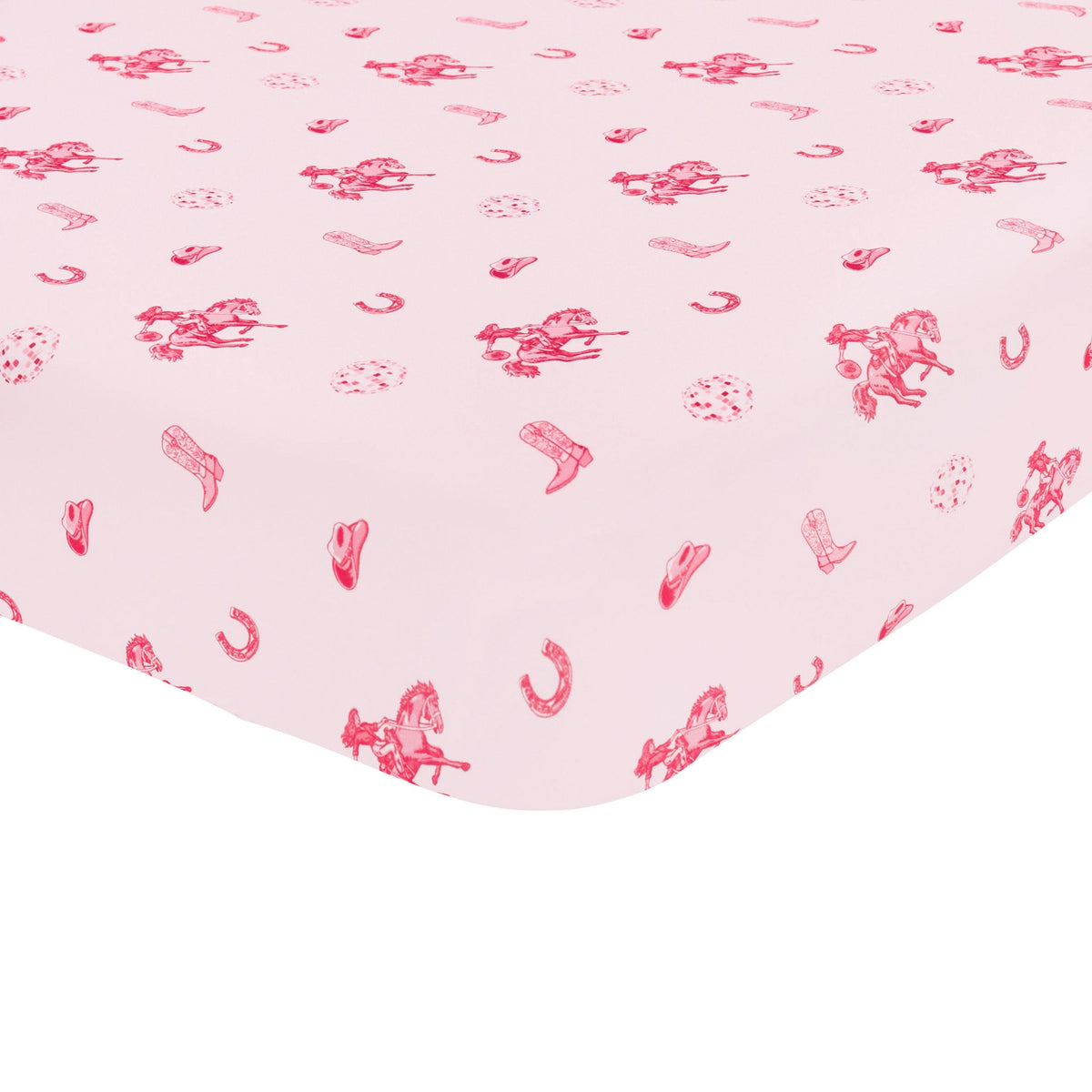 The corner of the Twin Sheet in Disco Cowgirl shown on a mattress