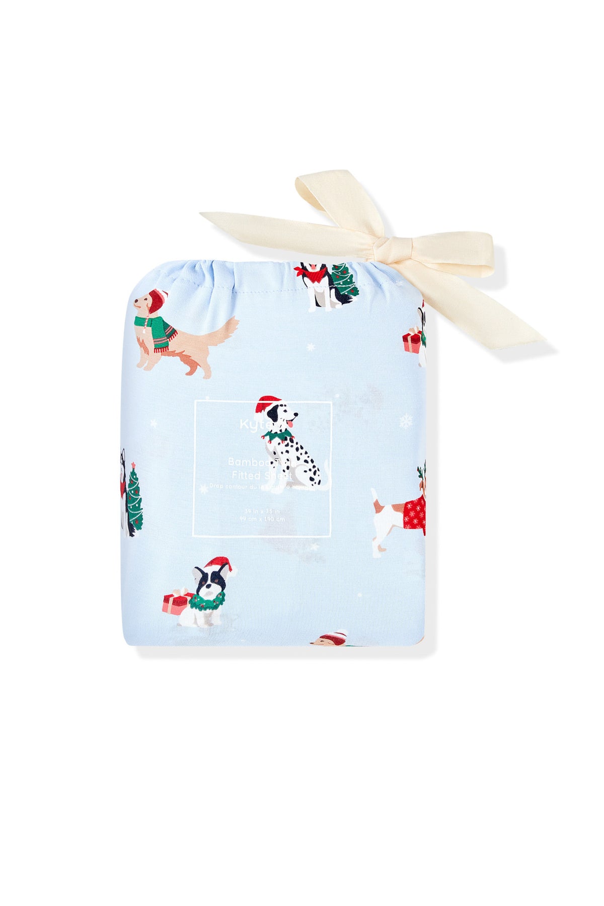 Blue Twin Sheet packed in a bog with Holiday Pups print on a white background