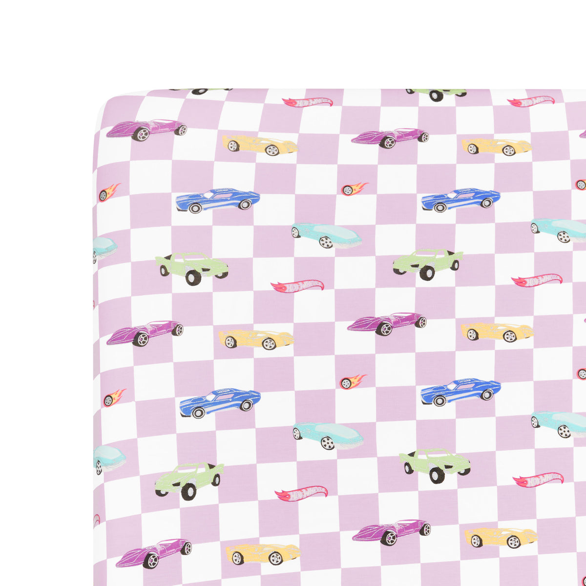 Close up on corner of the Twin Sheet in Sparkles and Speed on a mattress