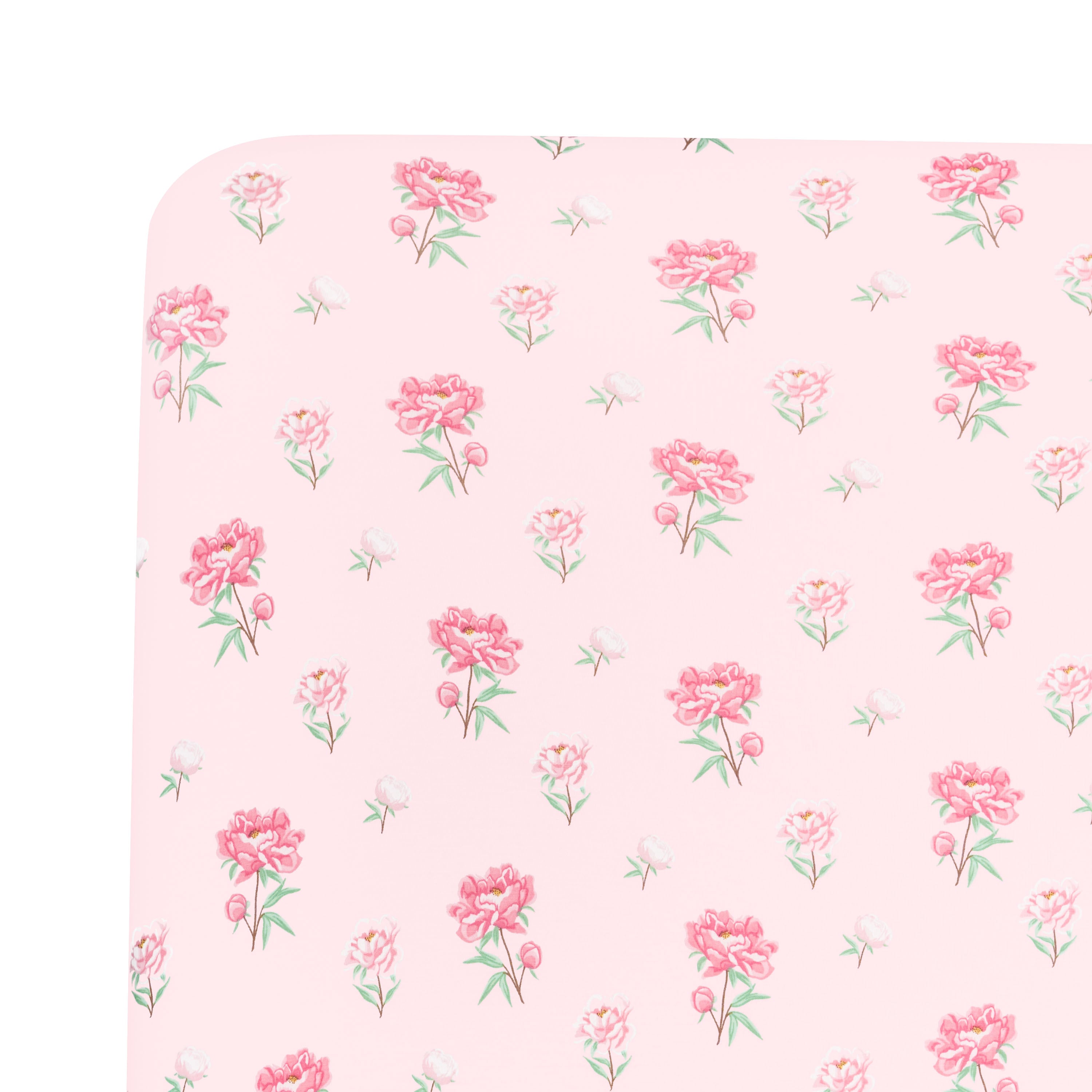 Close up of the corner of the Twin Sheet in Sakura Peony on a mattress