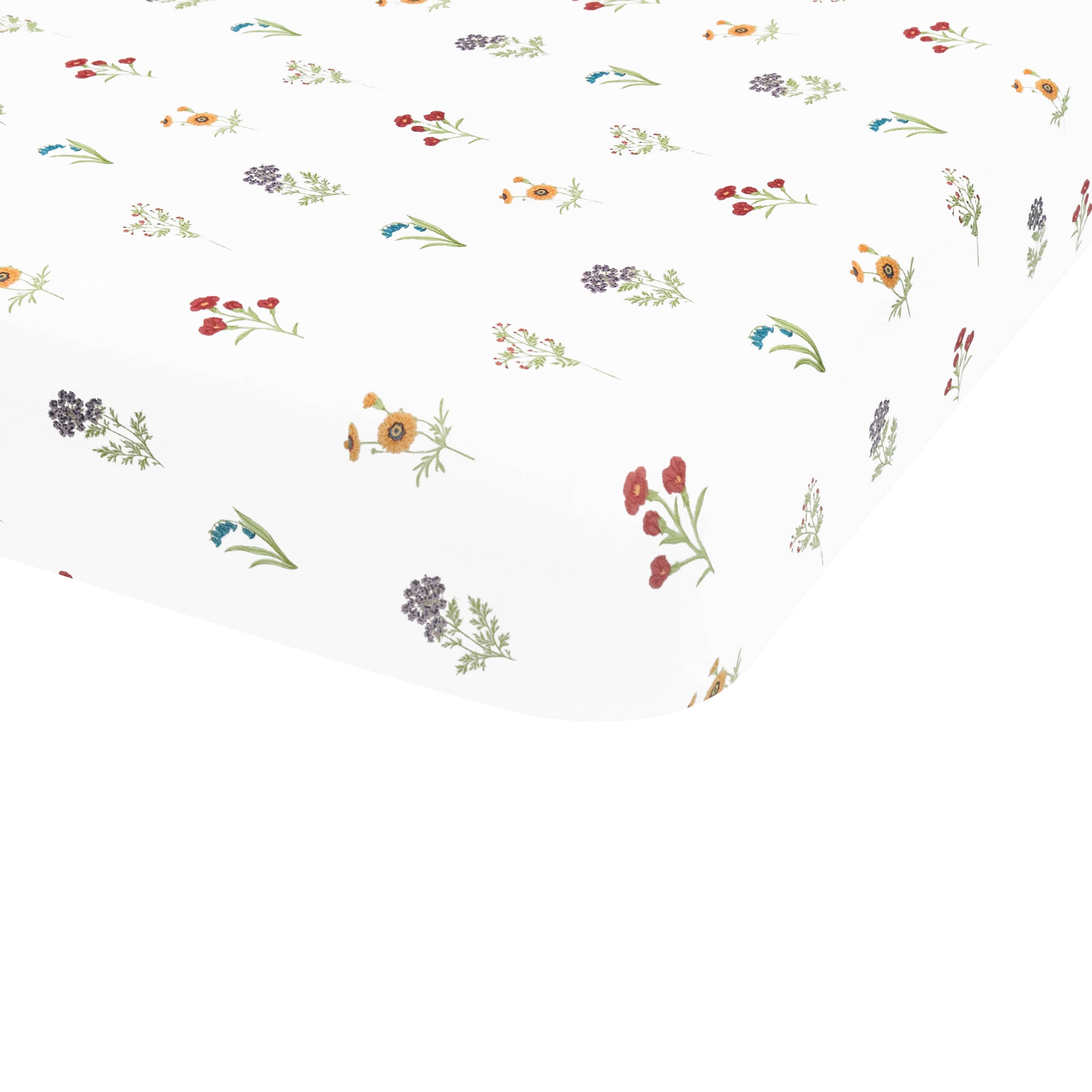 Twin Sheet in Wildflower shown on corner of a mattress