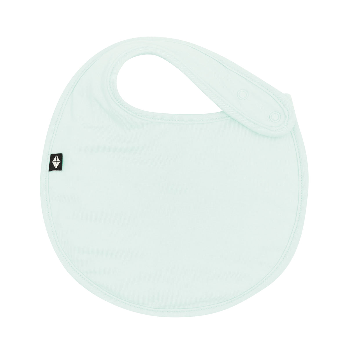 The front of the Cushy Bib in Dew showing the snap closures