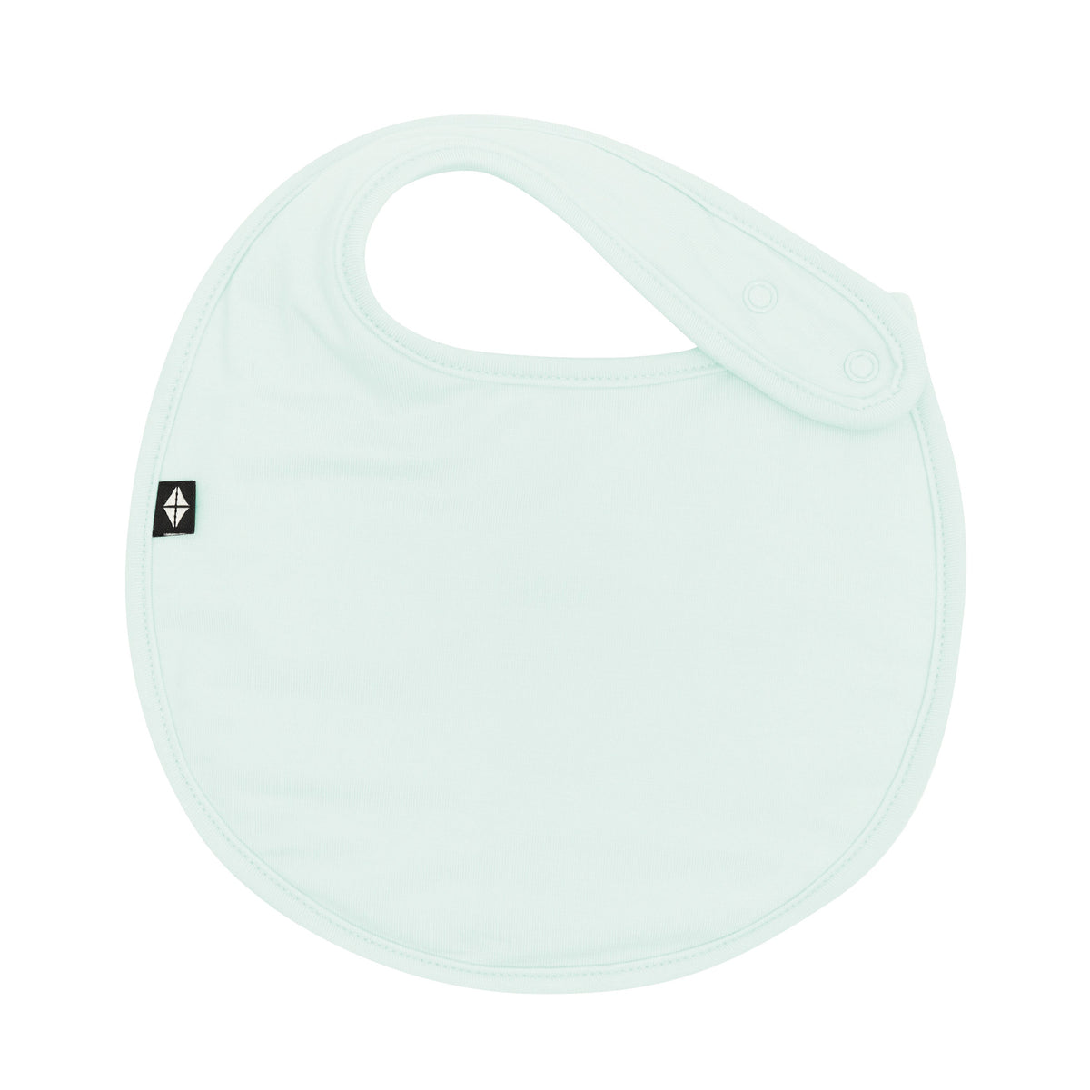 The front of the Cushy Bib in Dew showing the snap closures