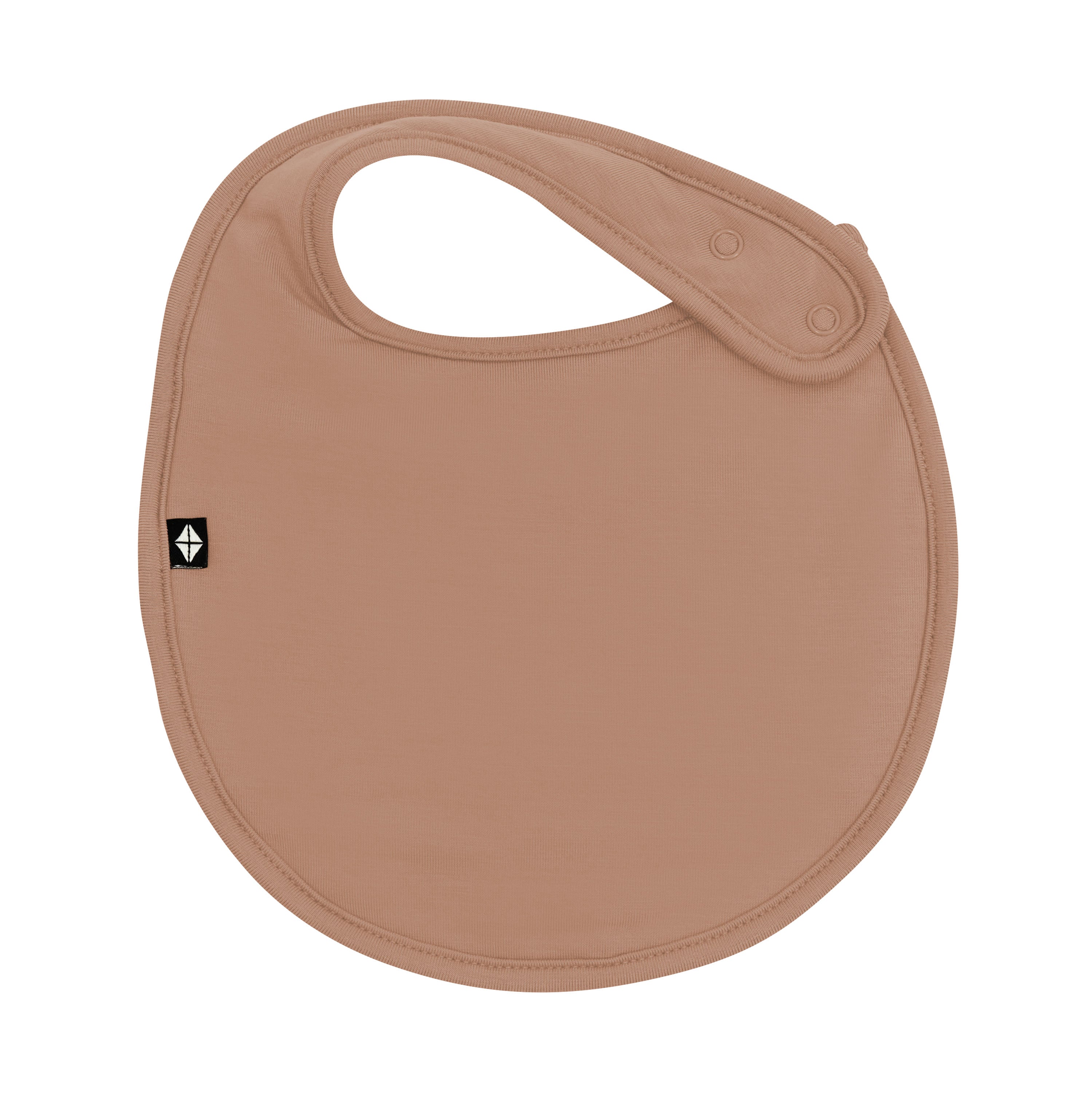 Front of Cushy Bib in Latte showing the snap closure