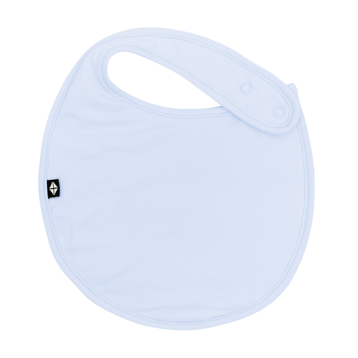 The front of the Cushy Bib in Mist showing the snap closures