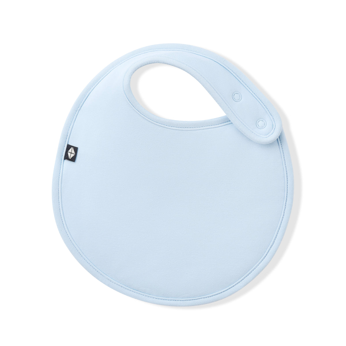 Font of the Cushy Bib in Breeze showing the snap closures