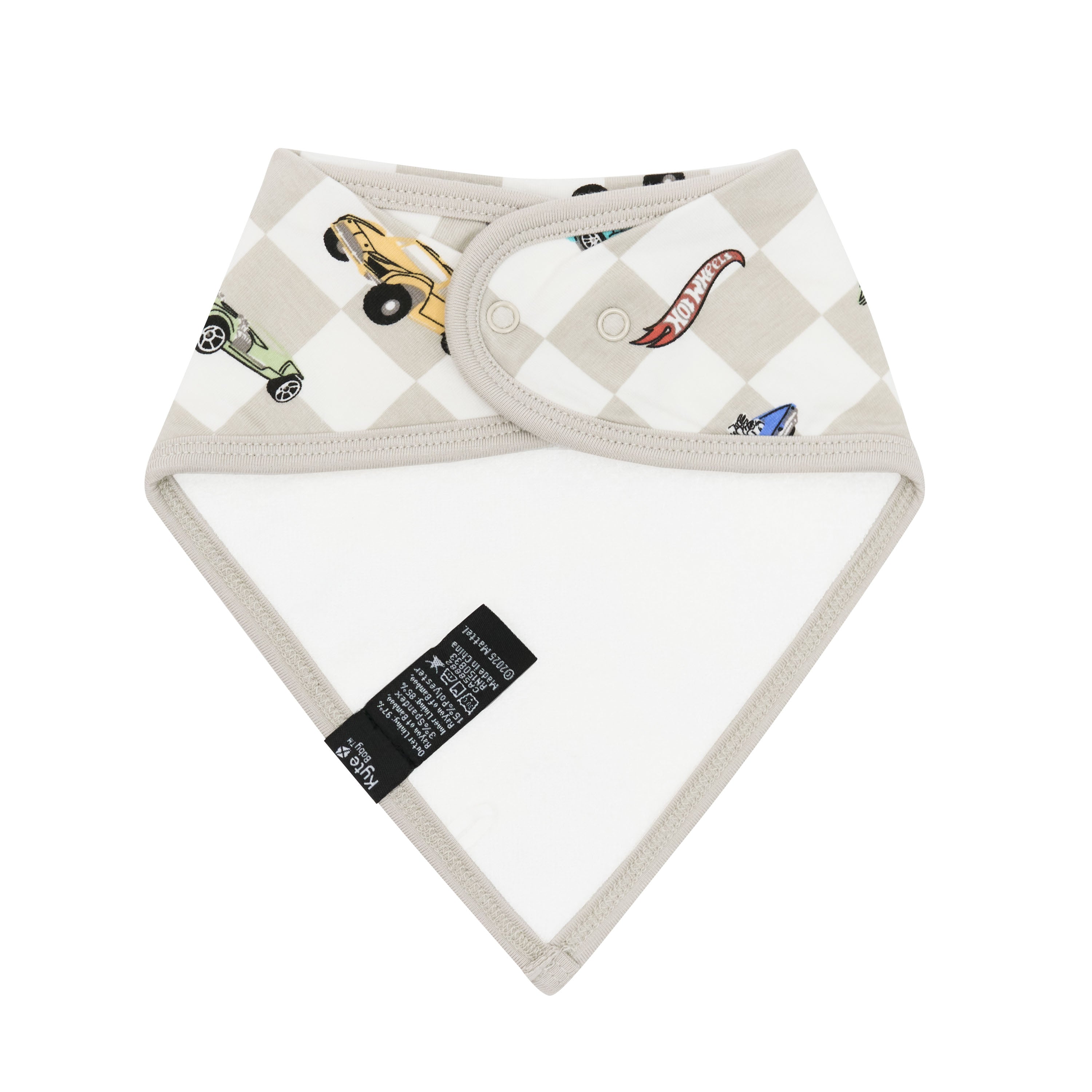 The back of Bib in Fast and Fierce showing the terry cloth bamboo lining and snap closures