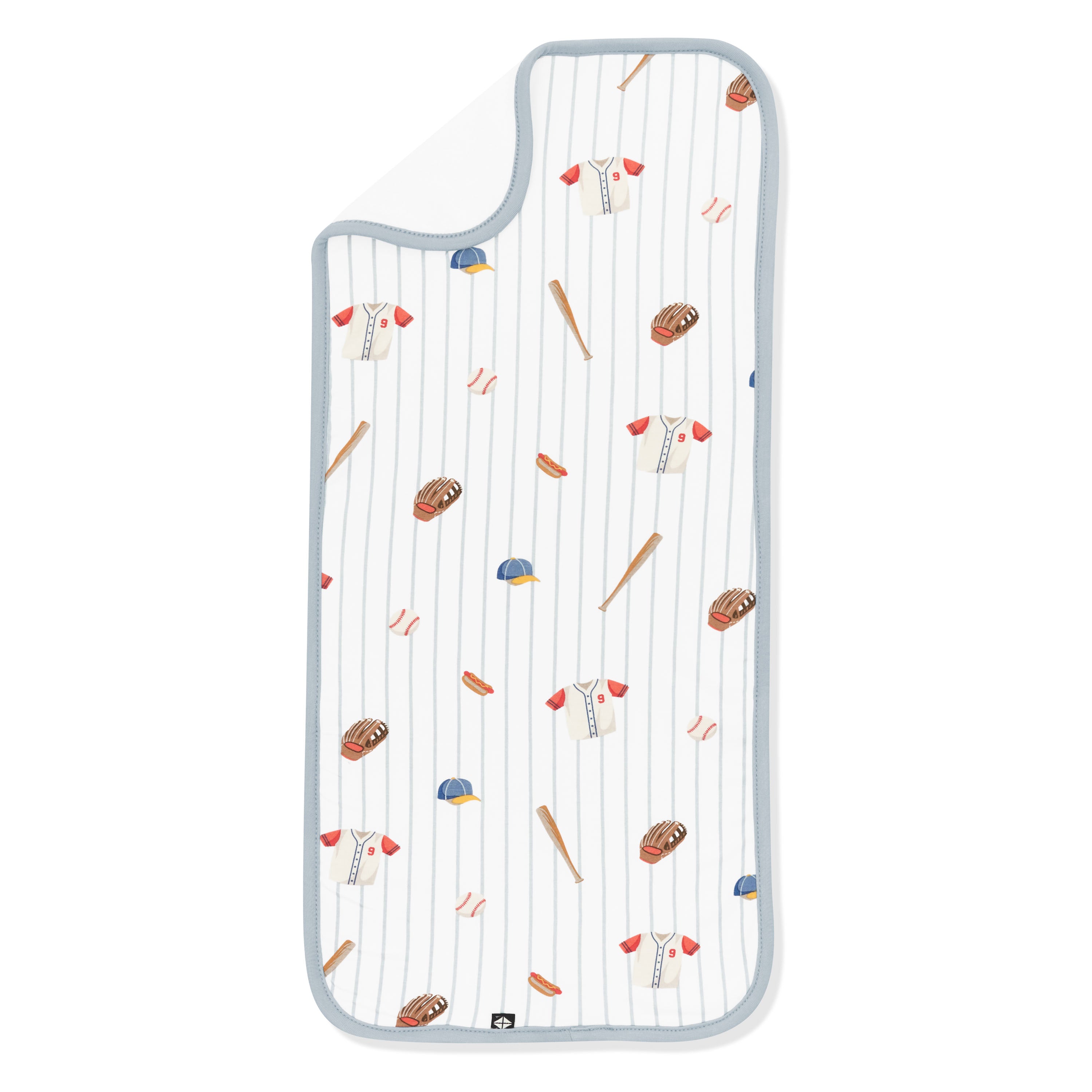 Burp Cloth in Home Run laid flat with the corner flipped down showing the bamboo terry cloth backing