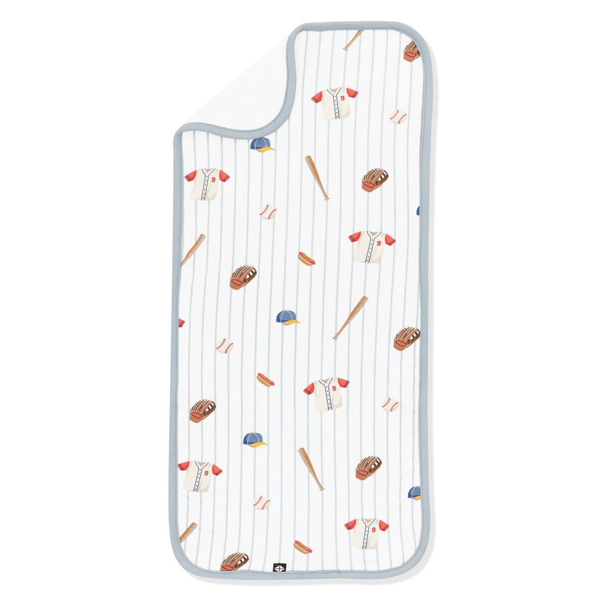 Burp Cloth in Home Run laid flat with the corner flipped down showing the bamboo terry cloth backing