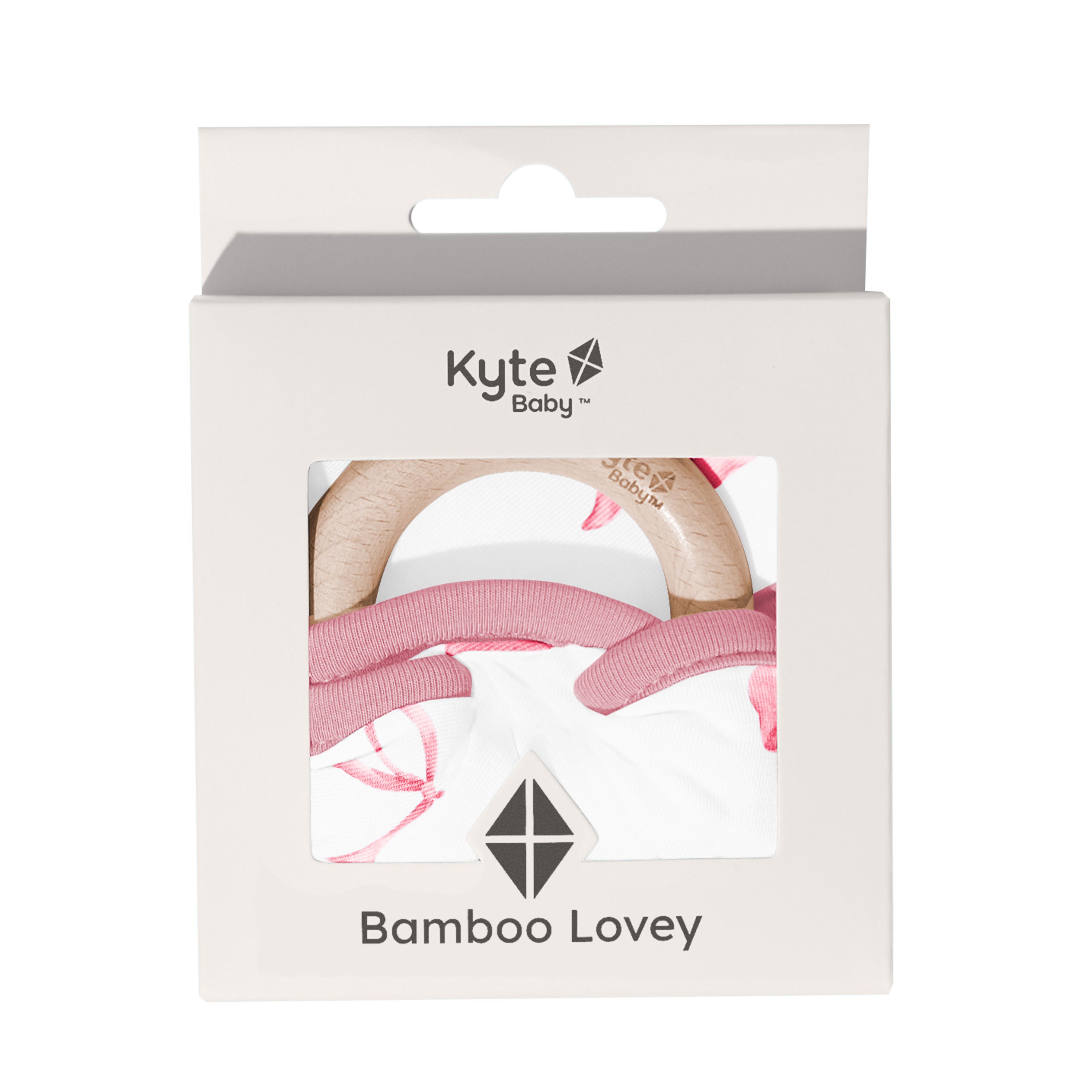 Lovey in Bow with Removable Wooden Teething Ring shown in its packaging