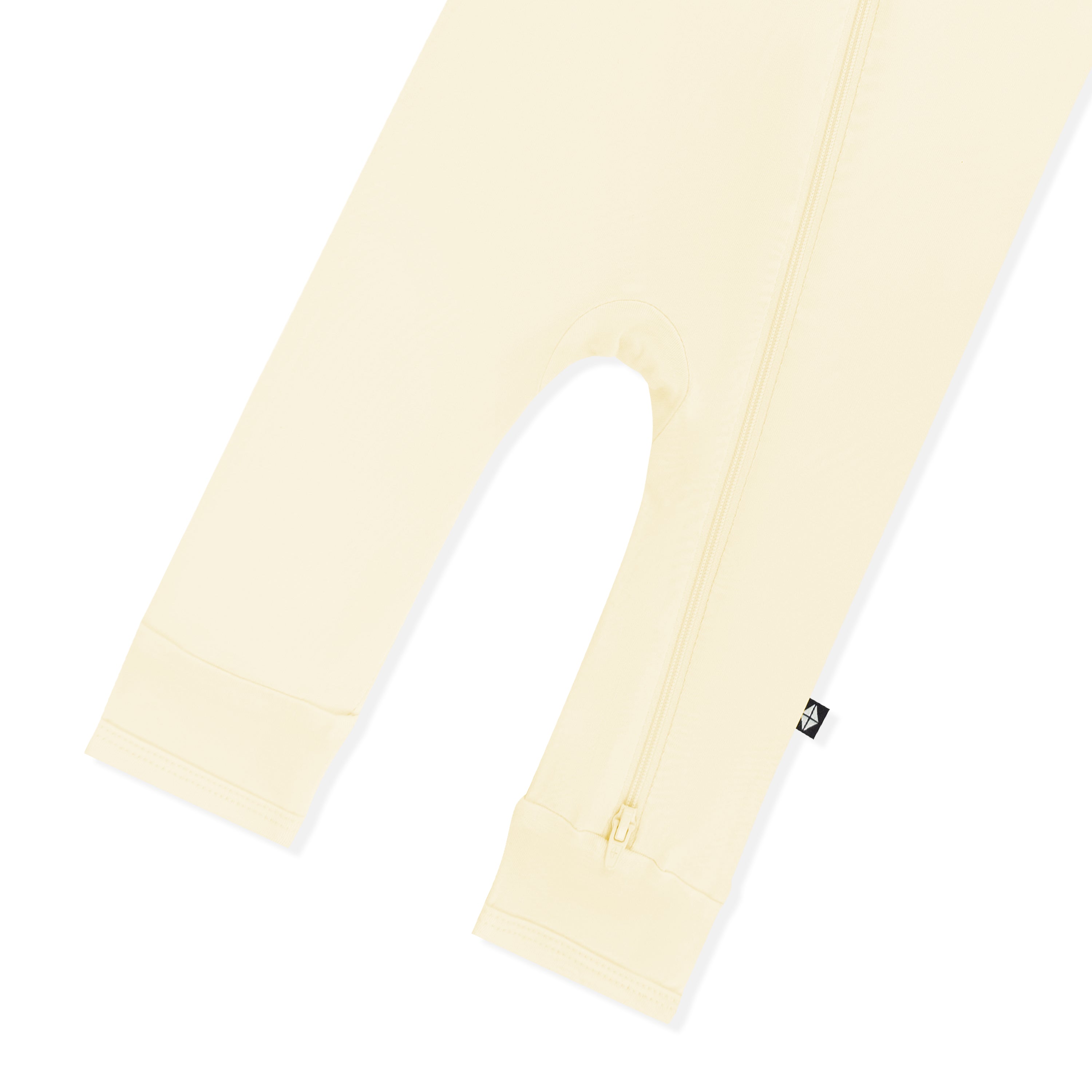 Zipper shown on the leg of the Zippered Romper in Chamomile