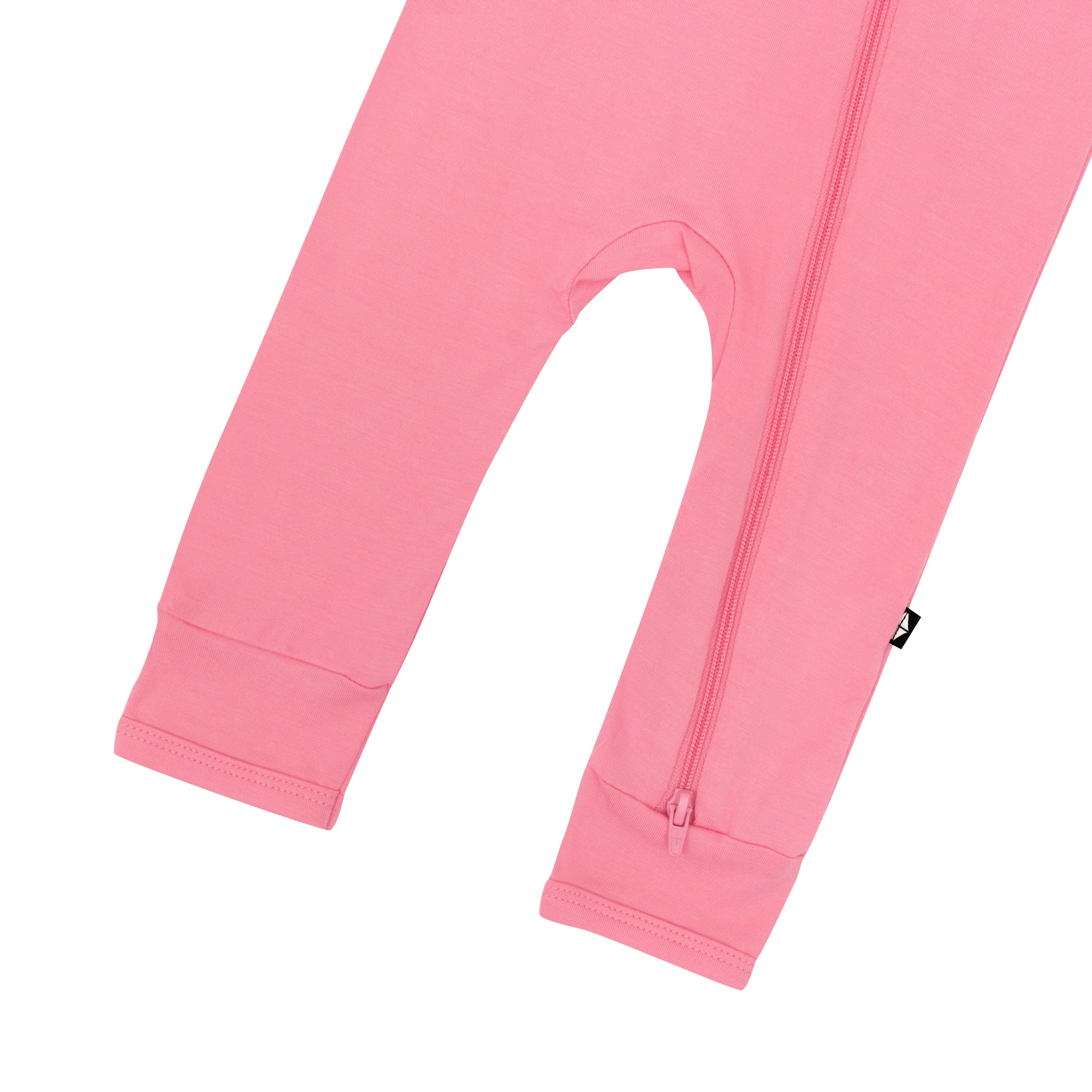 Dual zipper on Kyte Baby Zippered Romper in Guava pink