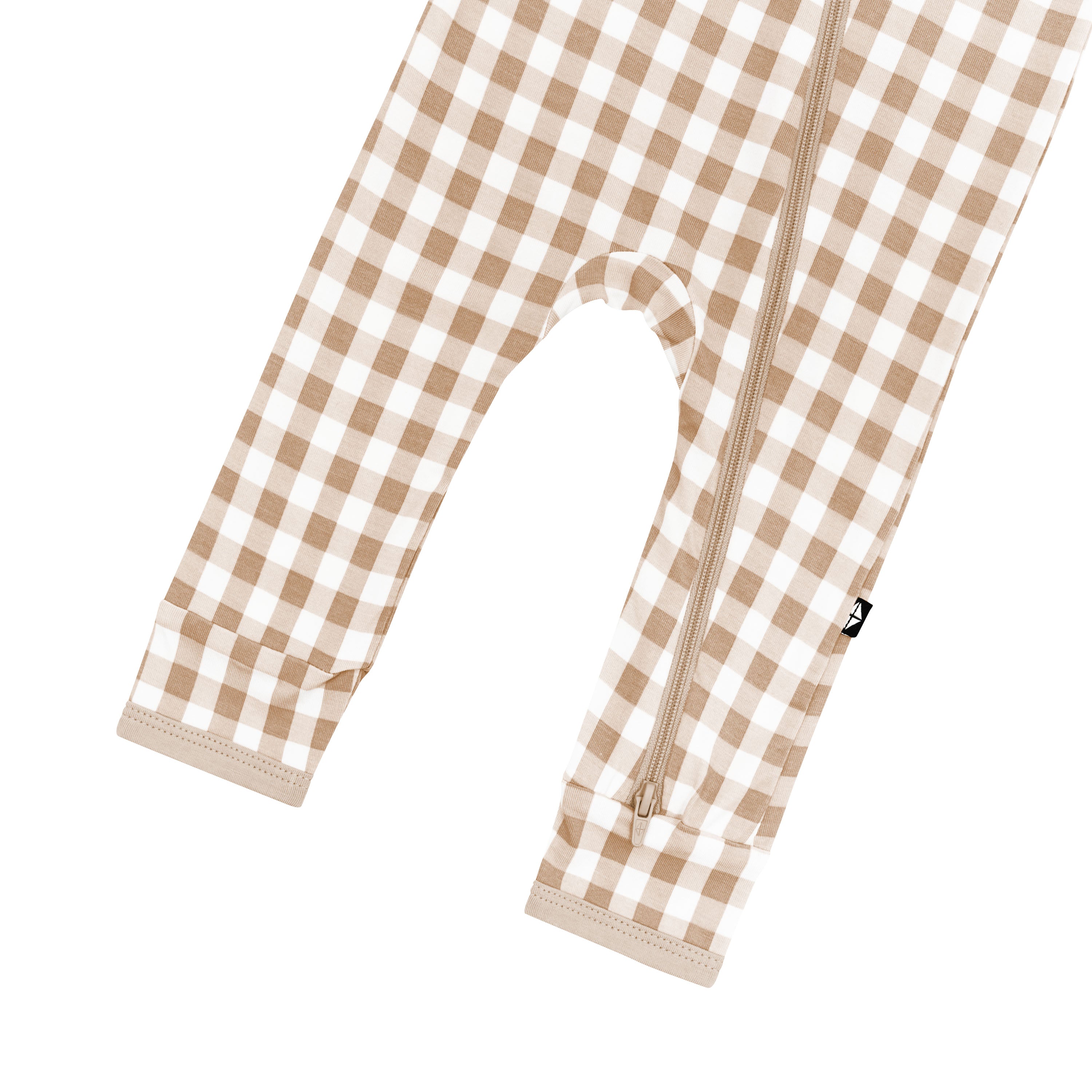 Zipper shown on the leg of the Zippered Romper in Gingham Bisque