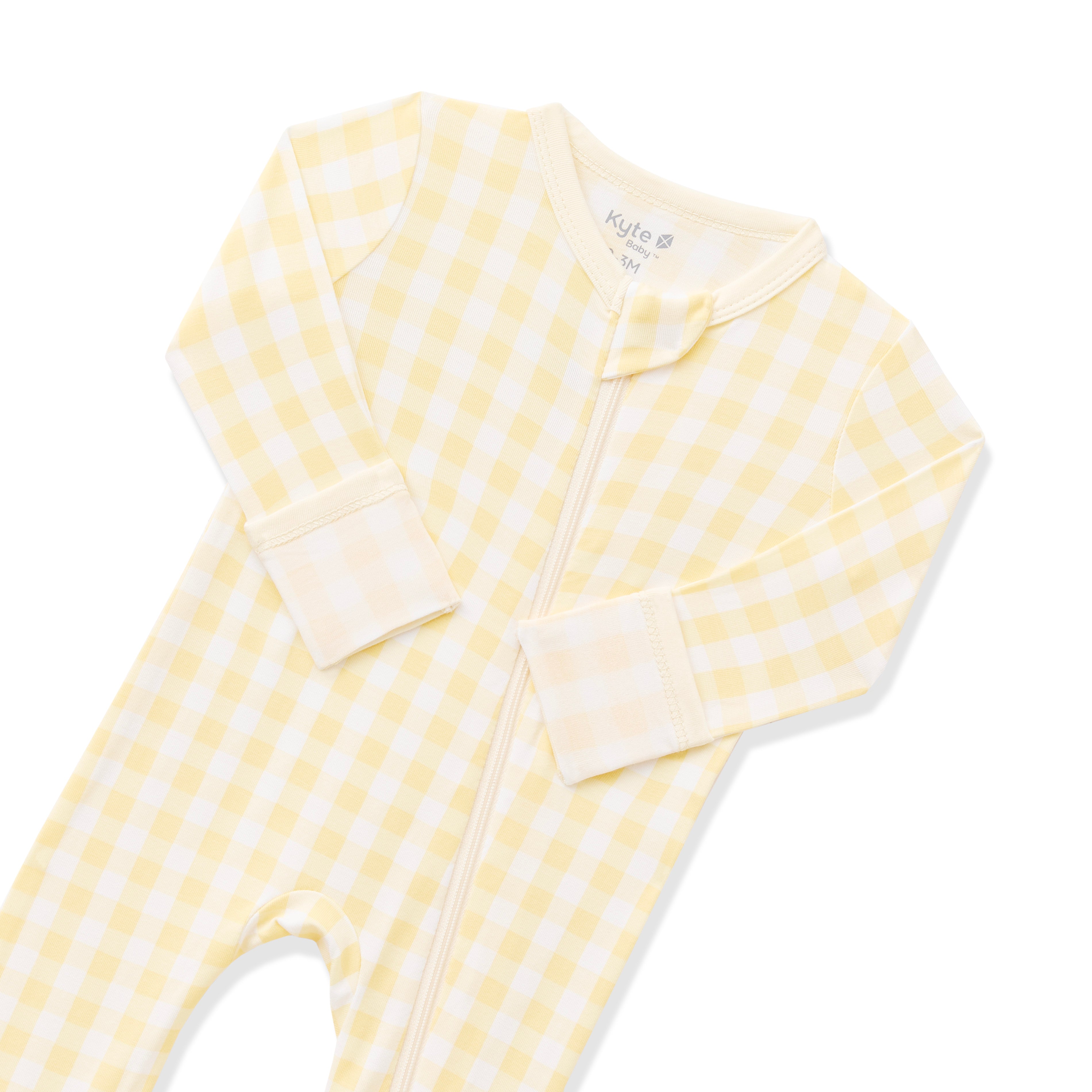 Zipper garage and fold over hand cuffs shown on the Zippered Romper in Gingham Chamomile