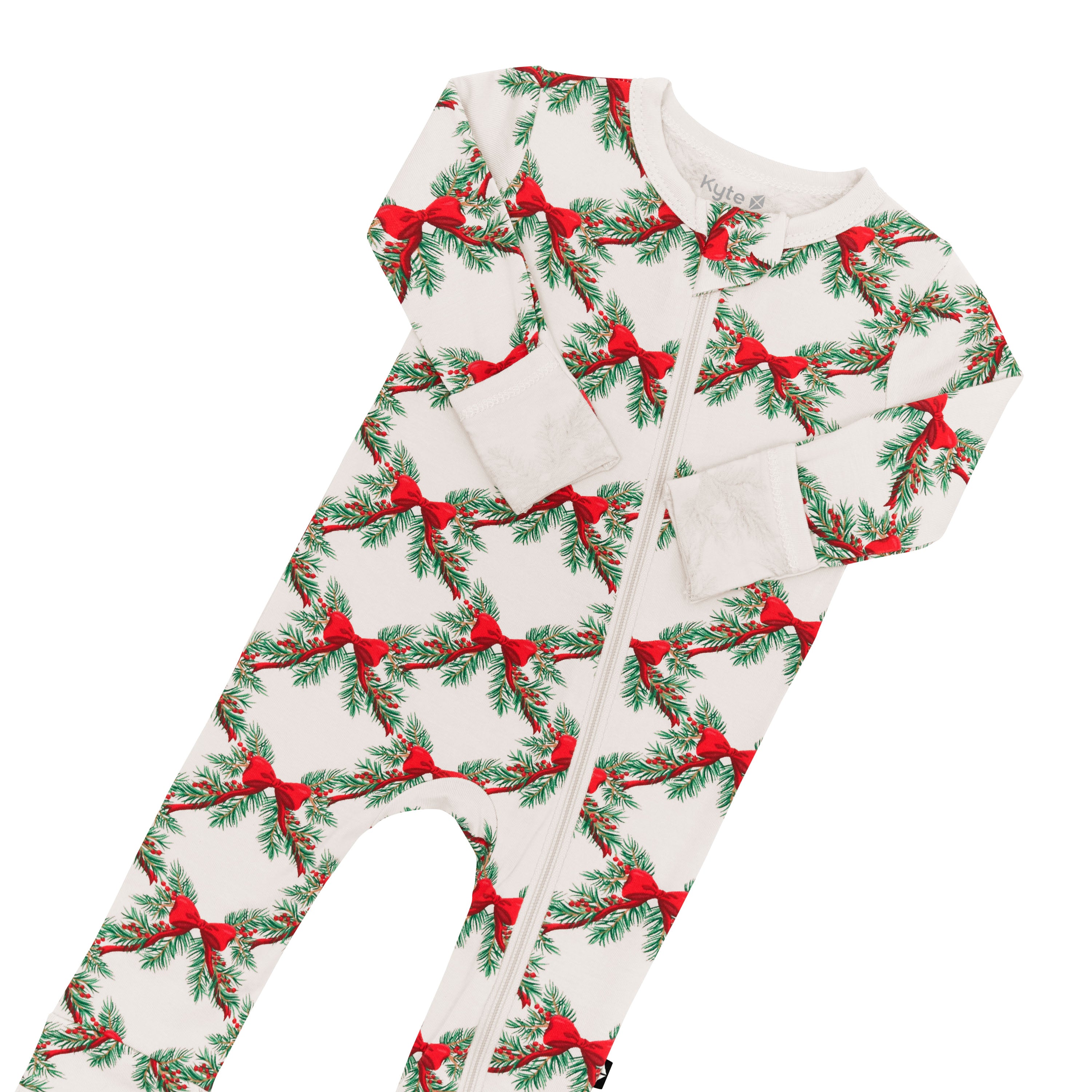 Zipper garage, zipper track and fold over hand cuffs shown on the Zippered Romper in Holiday Bow