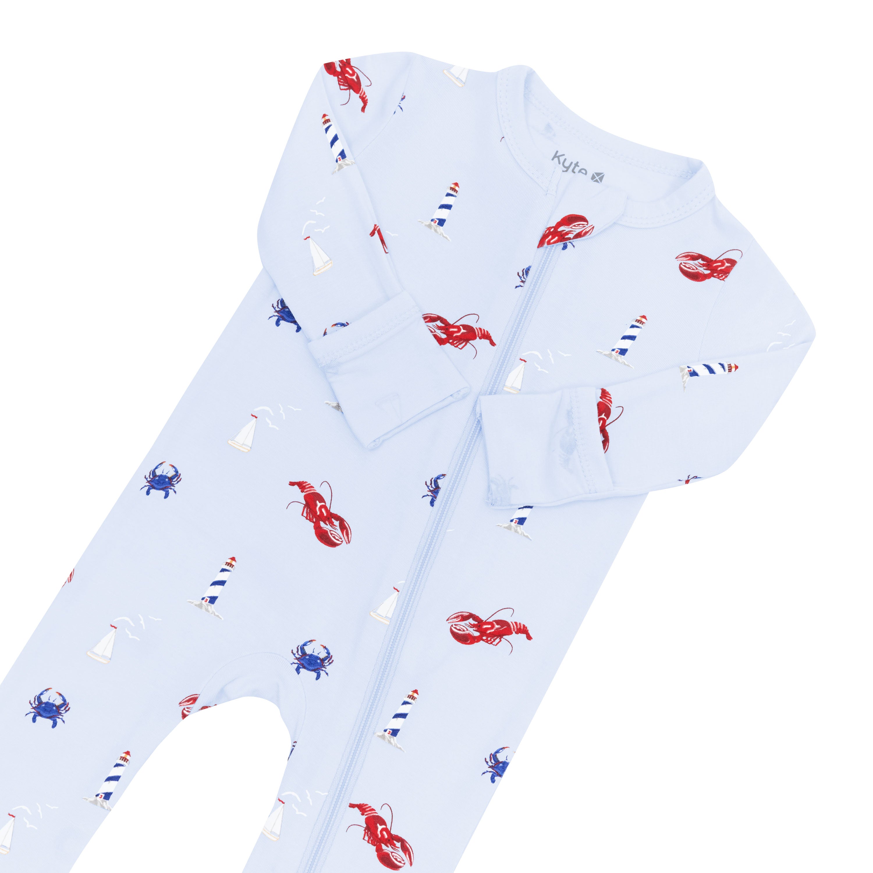 Zipper garage and fold over hand cuffs on the Zippered Romper in Harbor