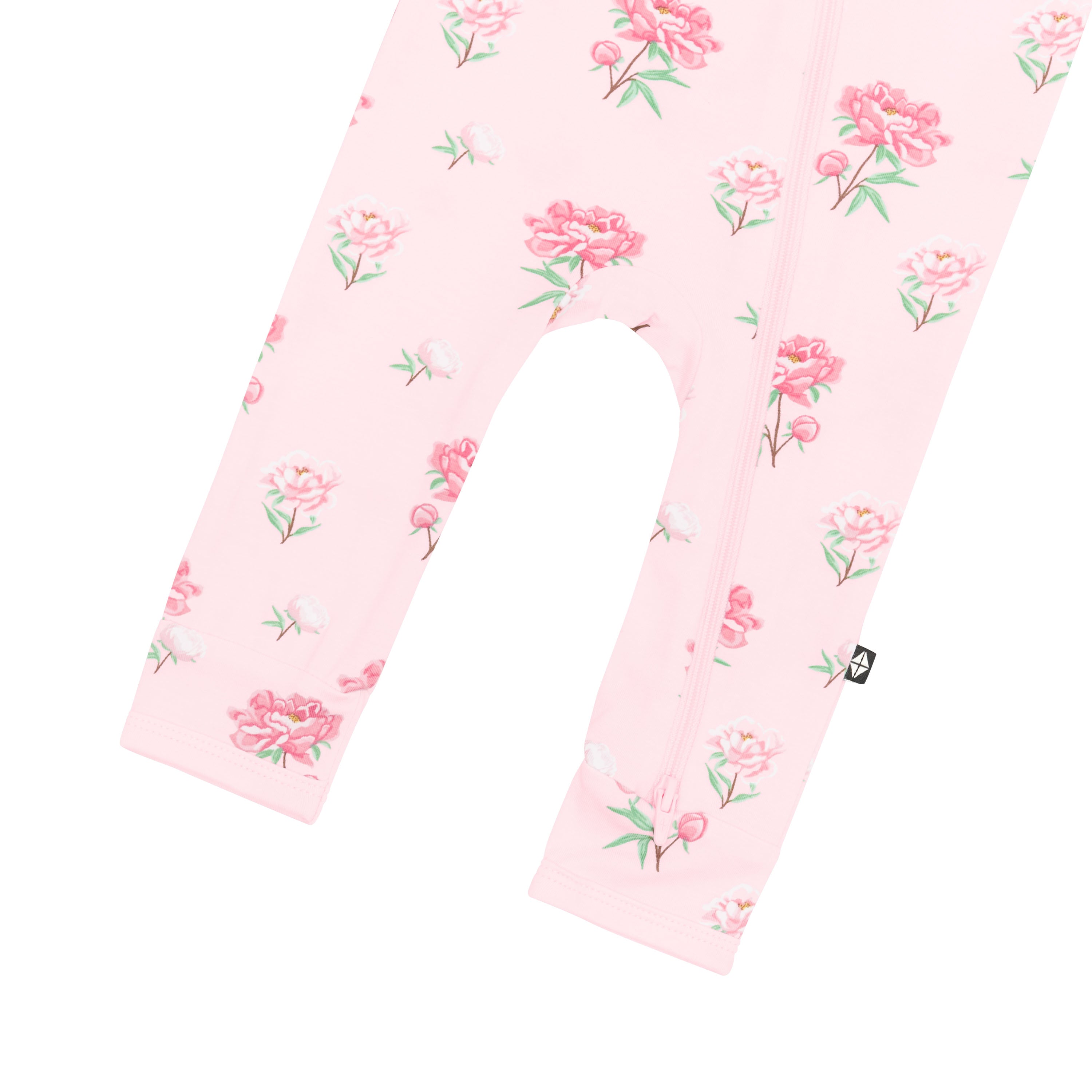 Double zipper shown on the leg of the Zippered Romper in Sakura Peony