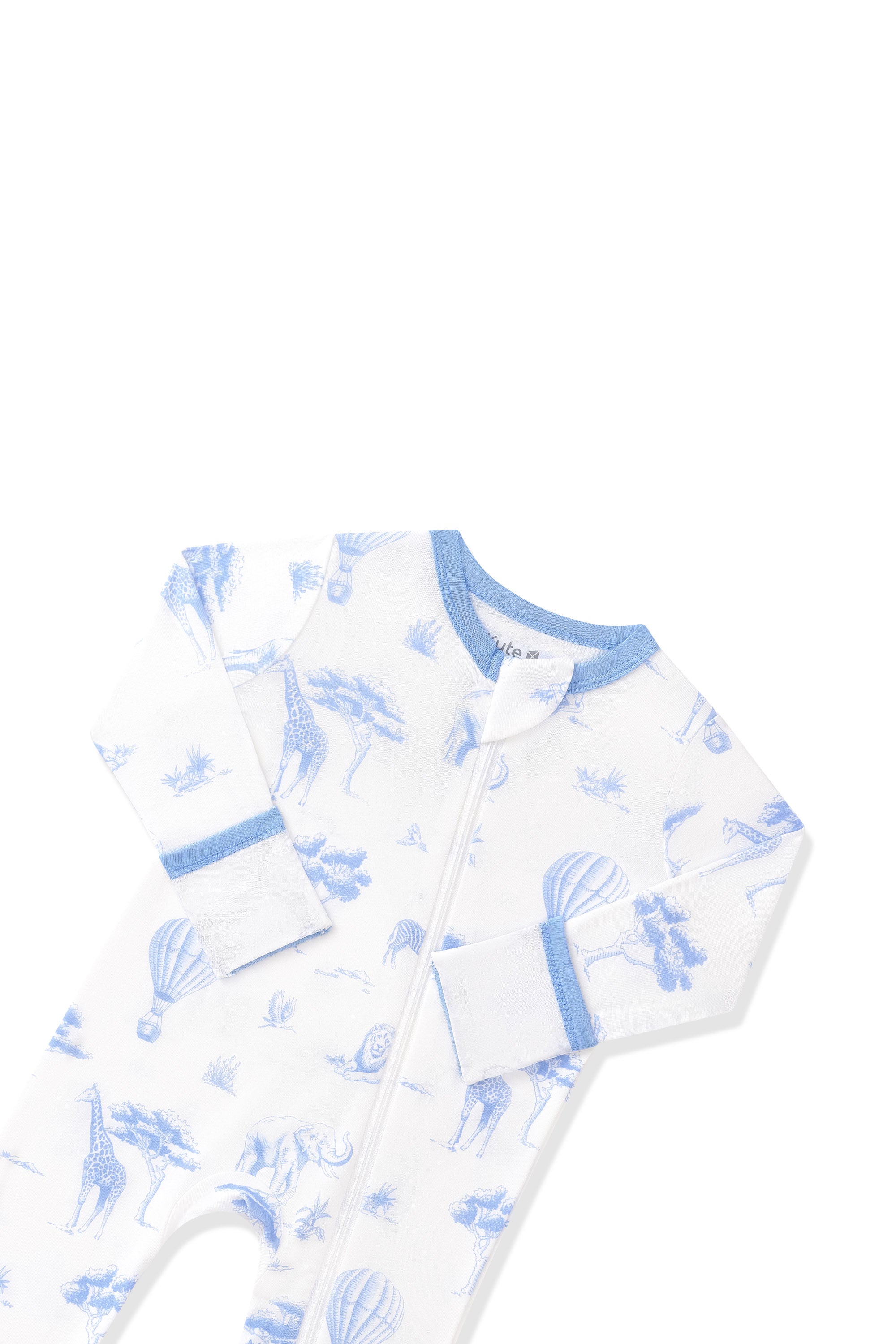 Close up of the zipper garage and fold over hand cuffs shown on the Zippered Romper in Toile Safari