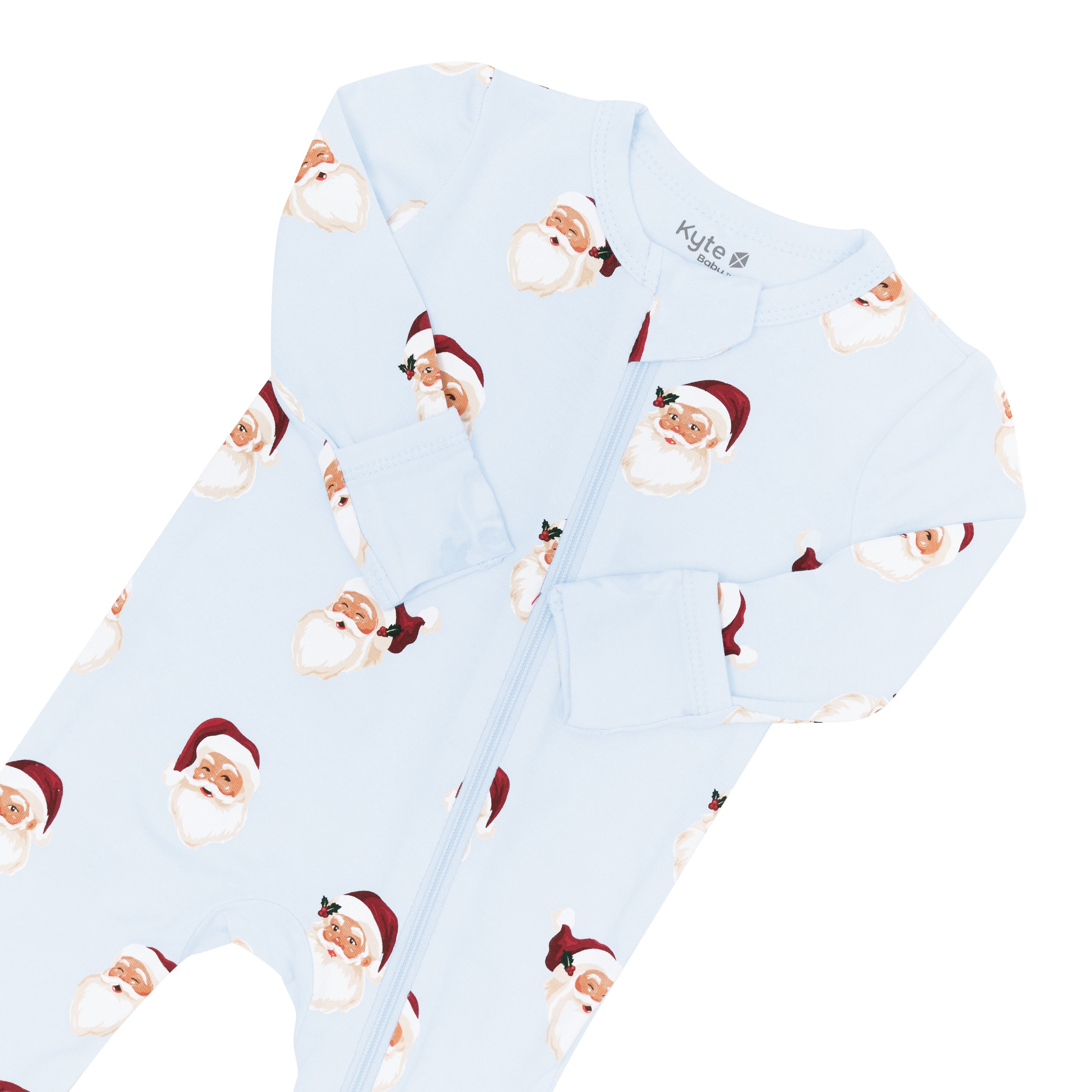 Close up of the zipper garage and fold over hand cuffs shown on the Zippered Romper in Vintage Santa