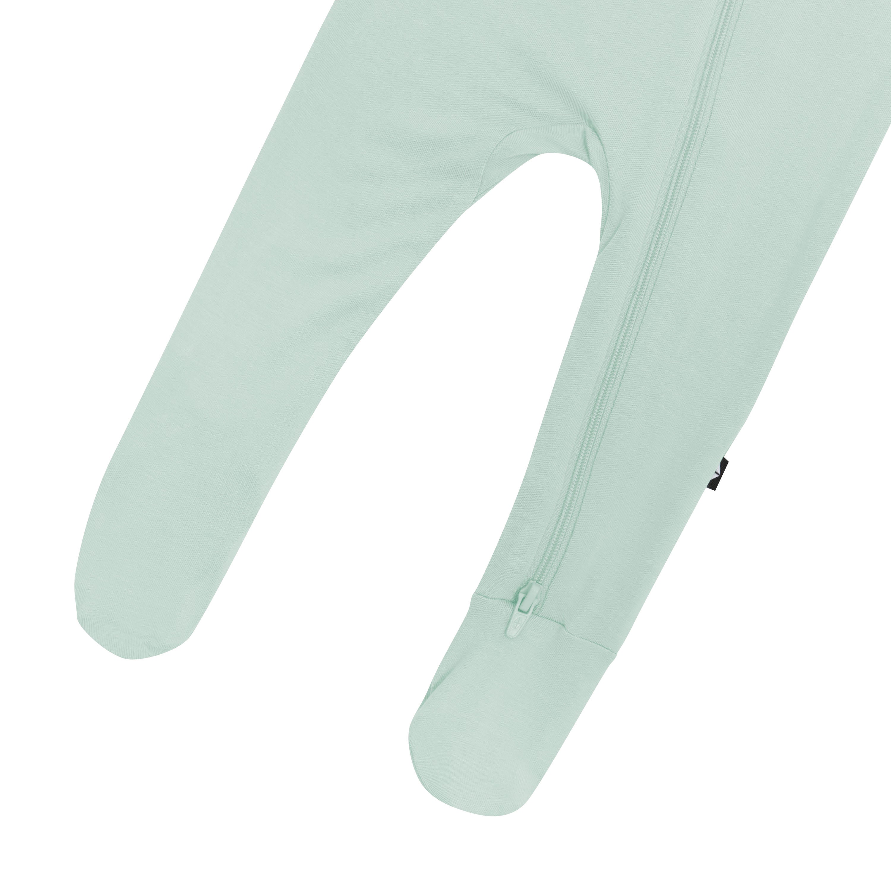Close up of legs and bottom zipper on Zippered Romper in Sage