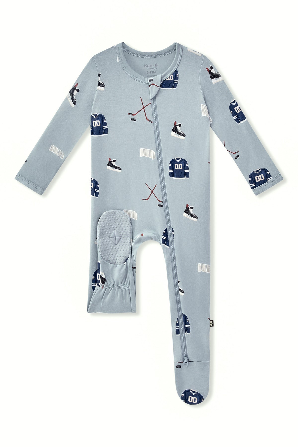 Zippered Footie in Vintage Hockey print with dotted footie on a white background