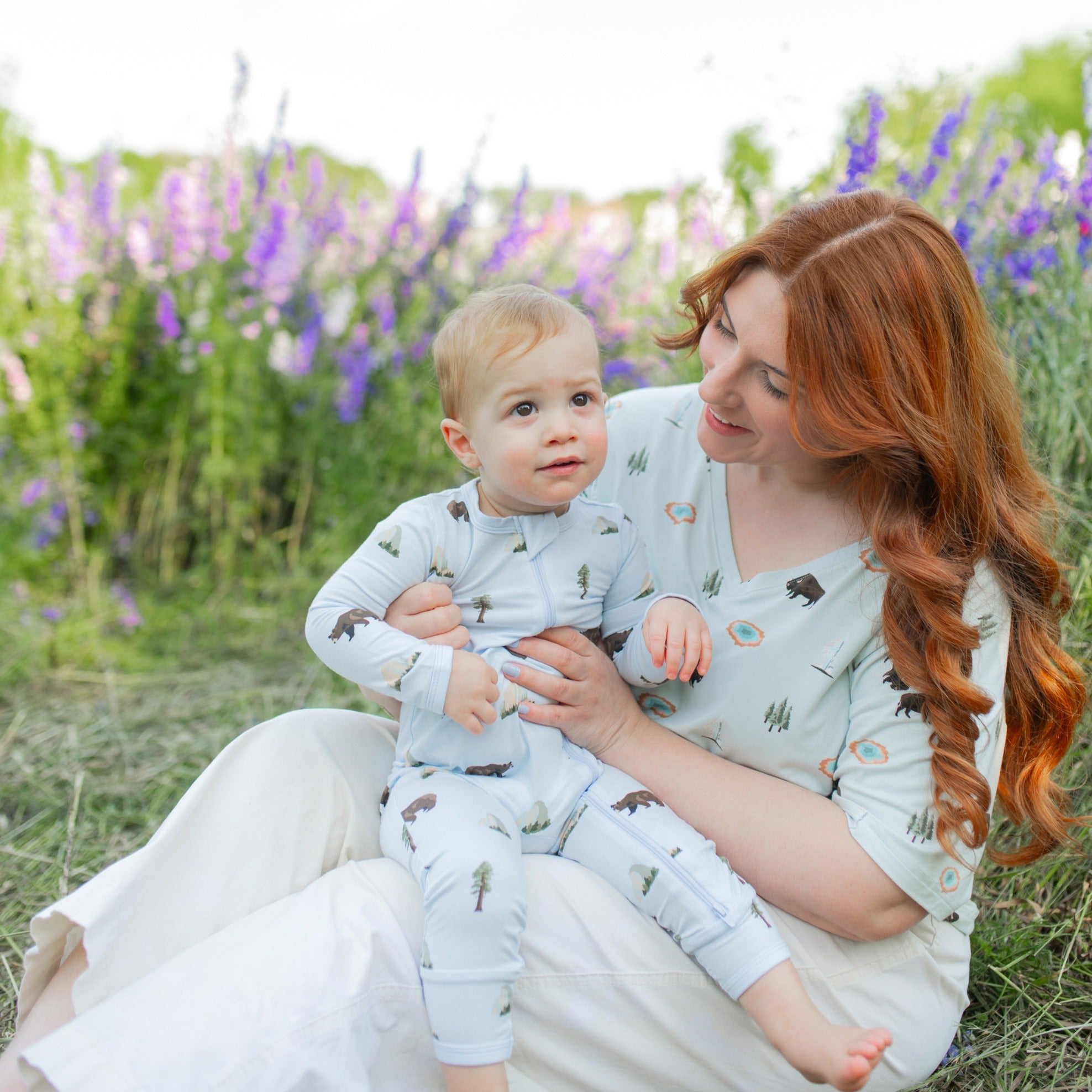 Toddler wearing Zippered Romper in Yosemite sitting with mom in Yellowstone v-neck