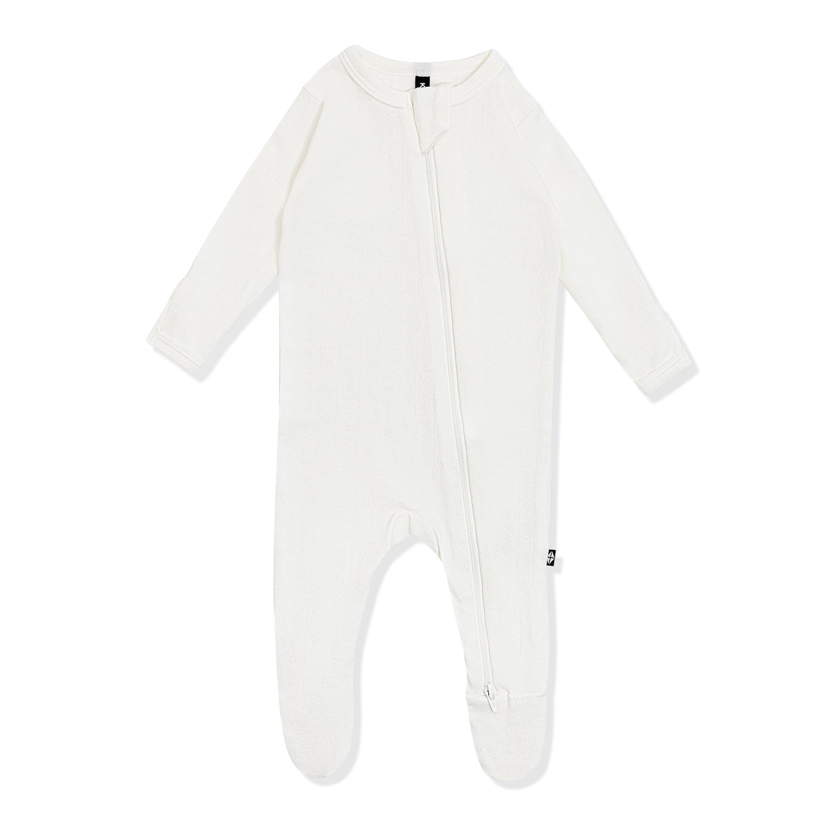 Pointelle Zippered Footie in Cloud on a white surface