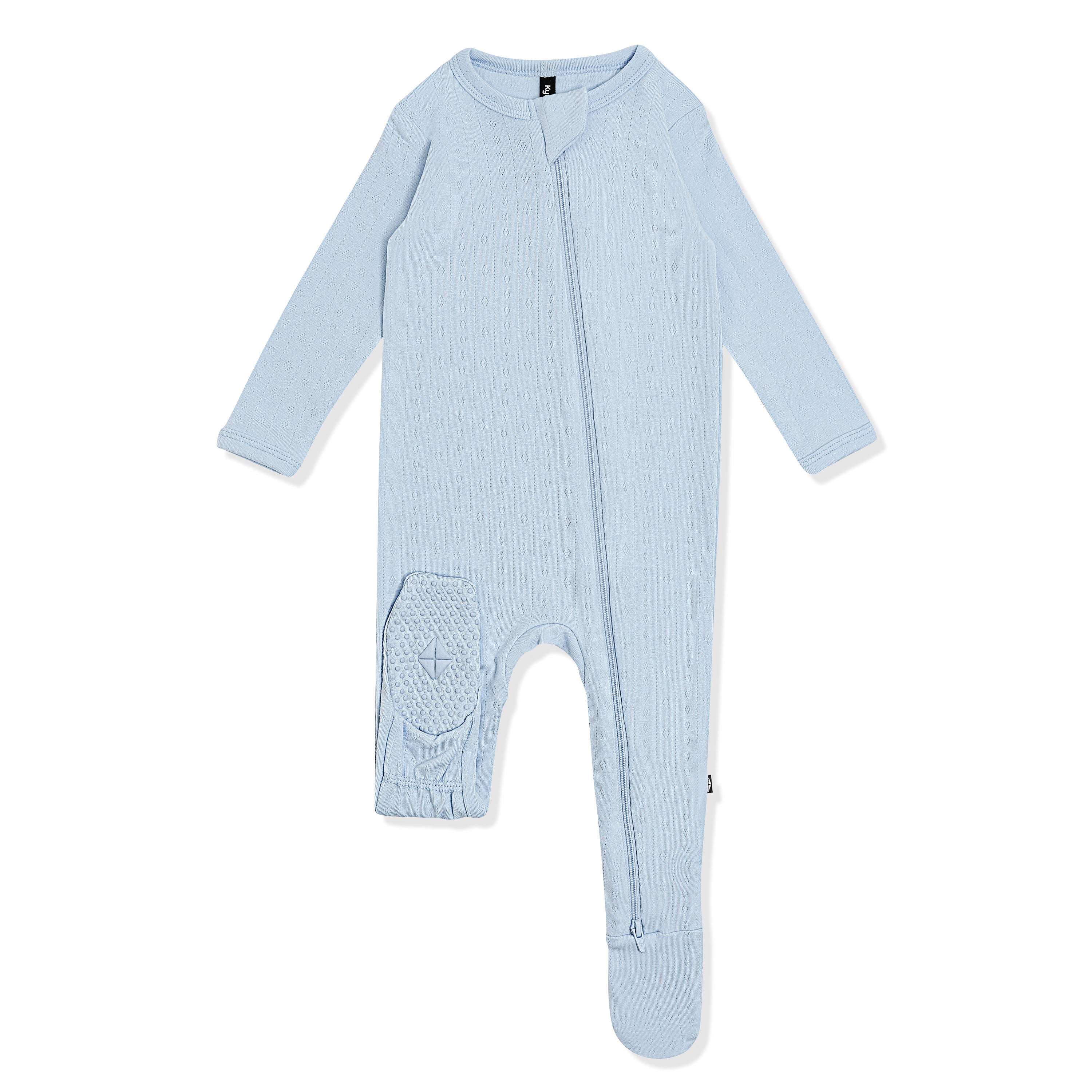 Foot pad with the Kyte Baby logo shown on the Pointelle Zippered Footie in Breeze
