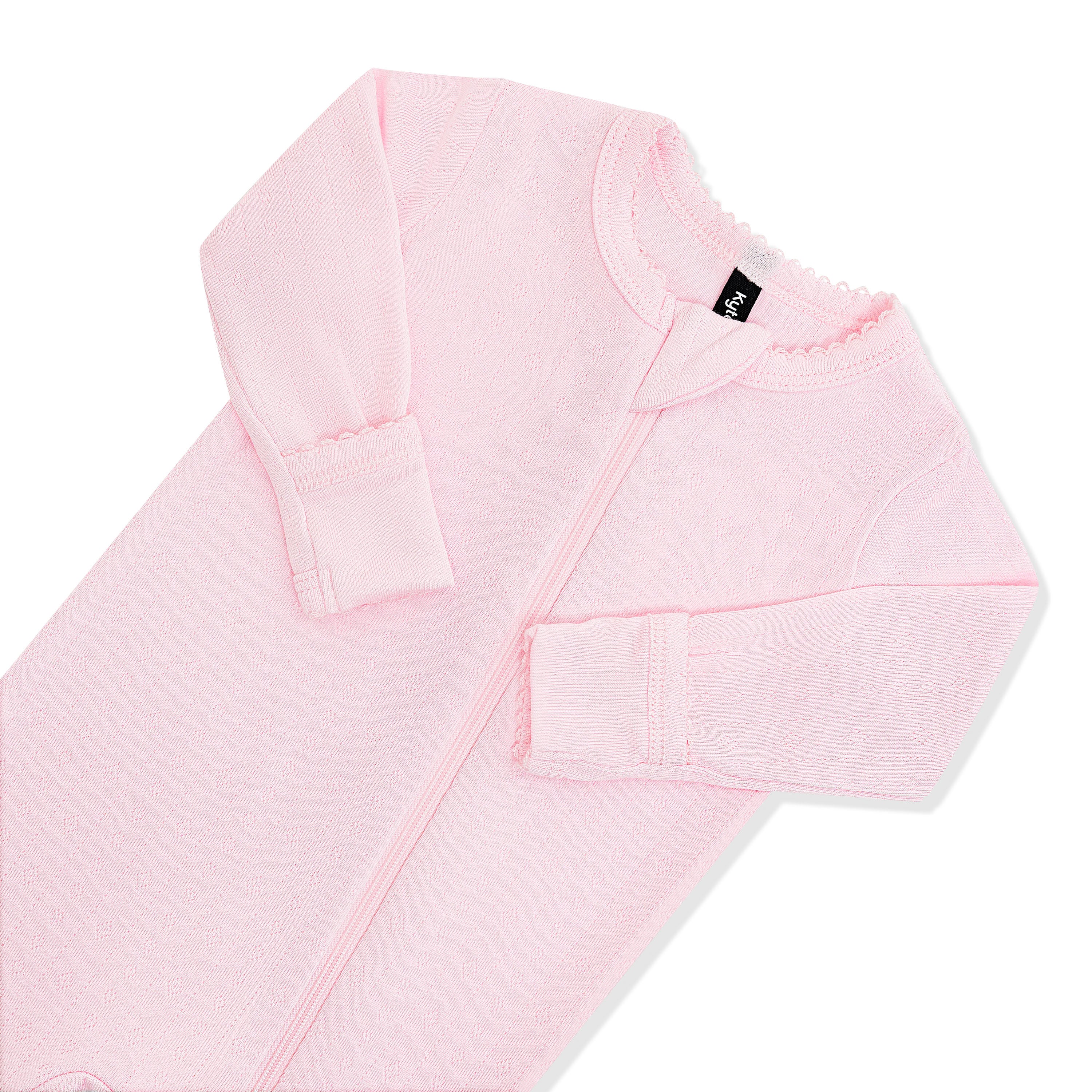 Close up of the picot trim, zipper garage and fold over hand cuffs shown on the Pointelle Zippered Footie in Sakura